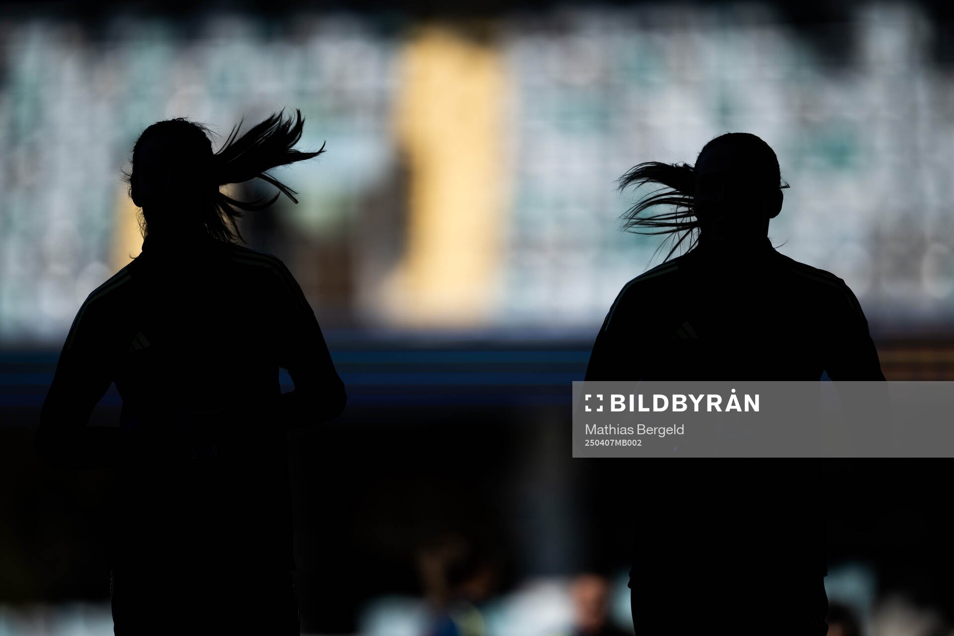 Silhouettes of Nathalie Björn and Magdalena Eriksson of