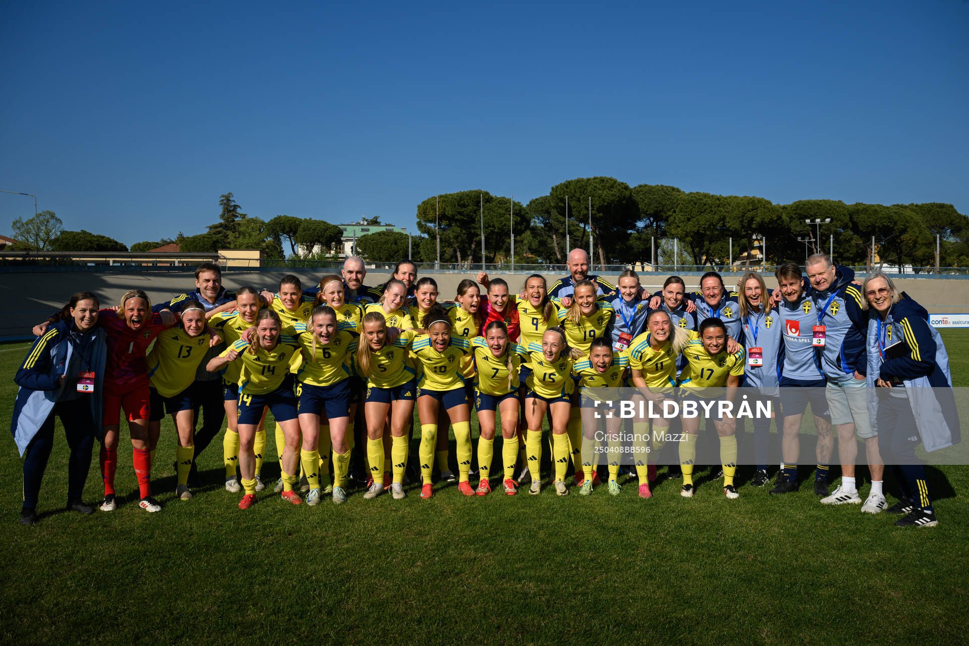 Players and staff of Sweden celebrate