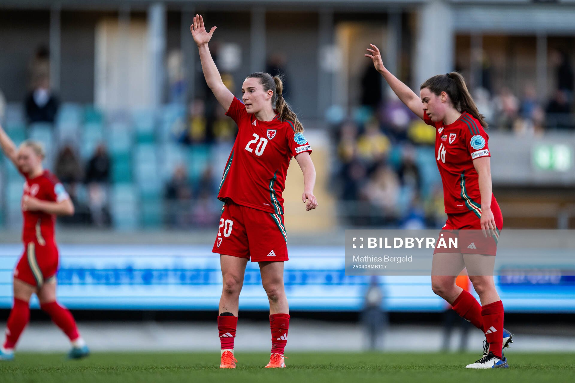 Carrie Jones and Mared Griffiths of Wales react