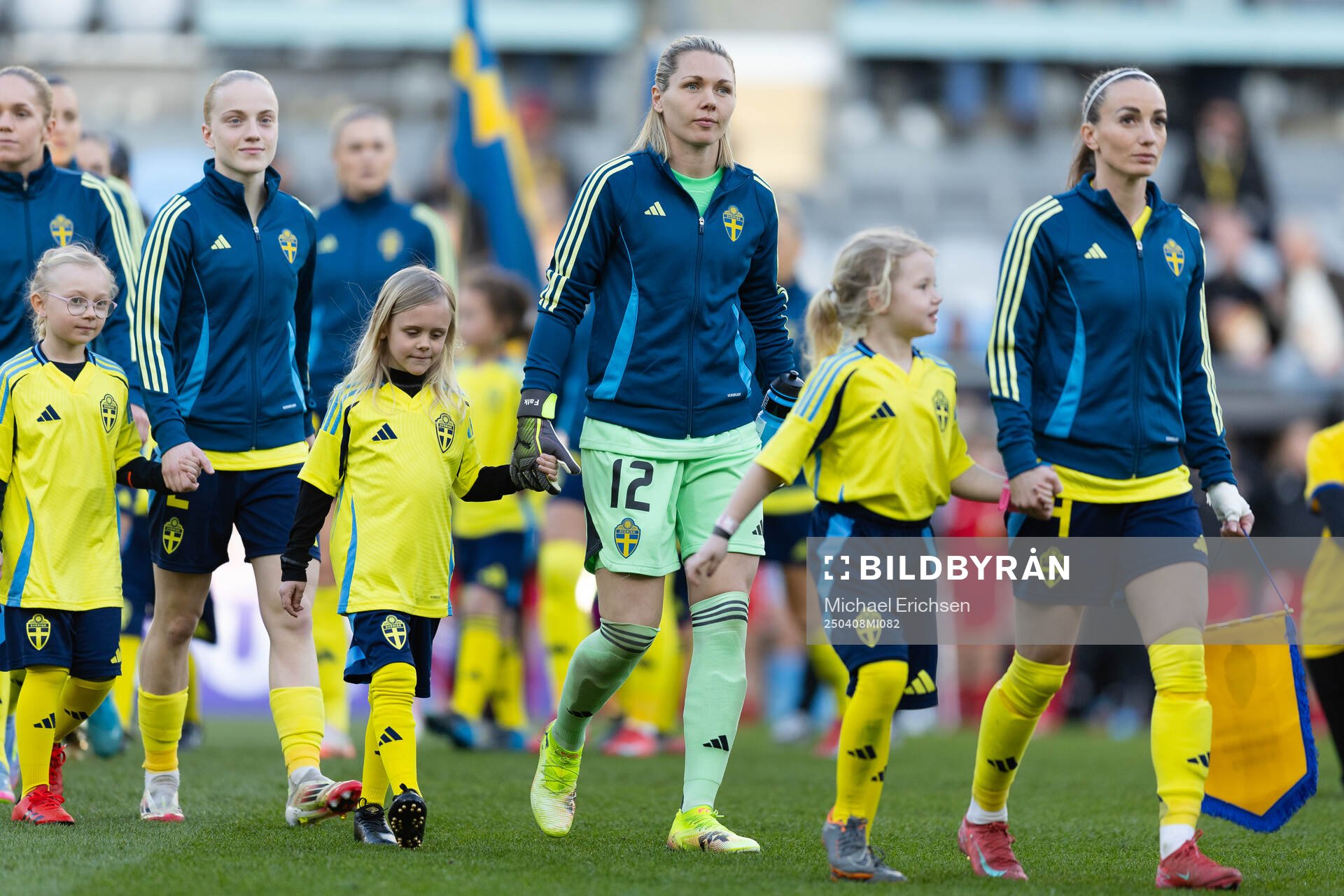 Goalkeeper Jennifer Falk and Kosovare Asllani of Sweden