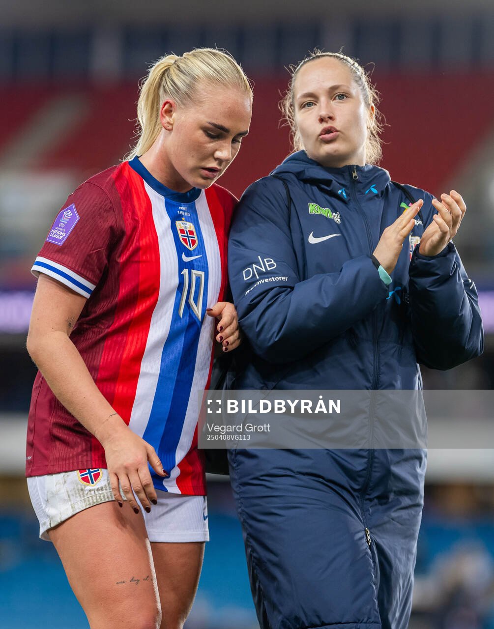 Cathinka Tandberg and goalkeeper Aurora Mikalsen of Norway