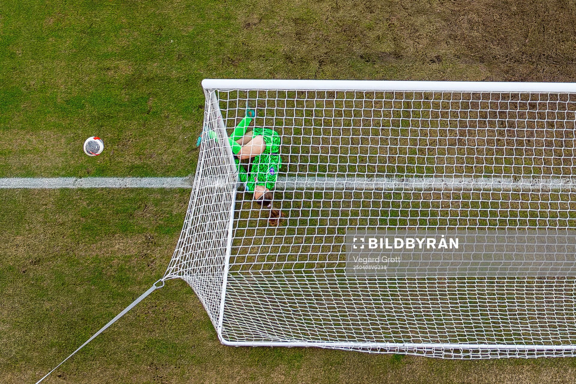 Goalkeeper Cecilie Fiskerstrand of Norway crashes into the