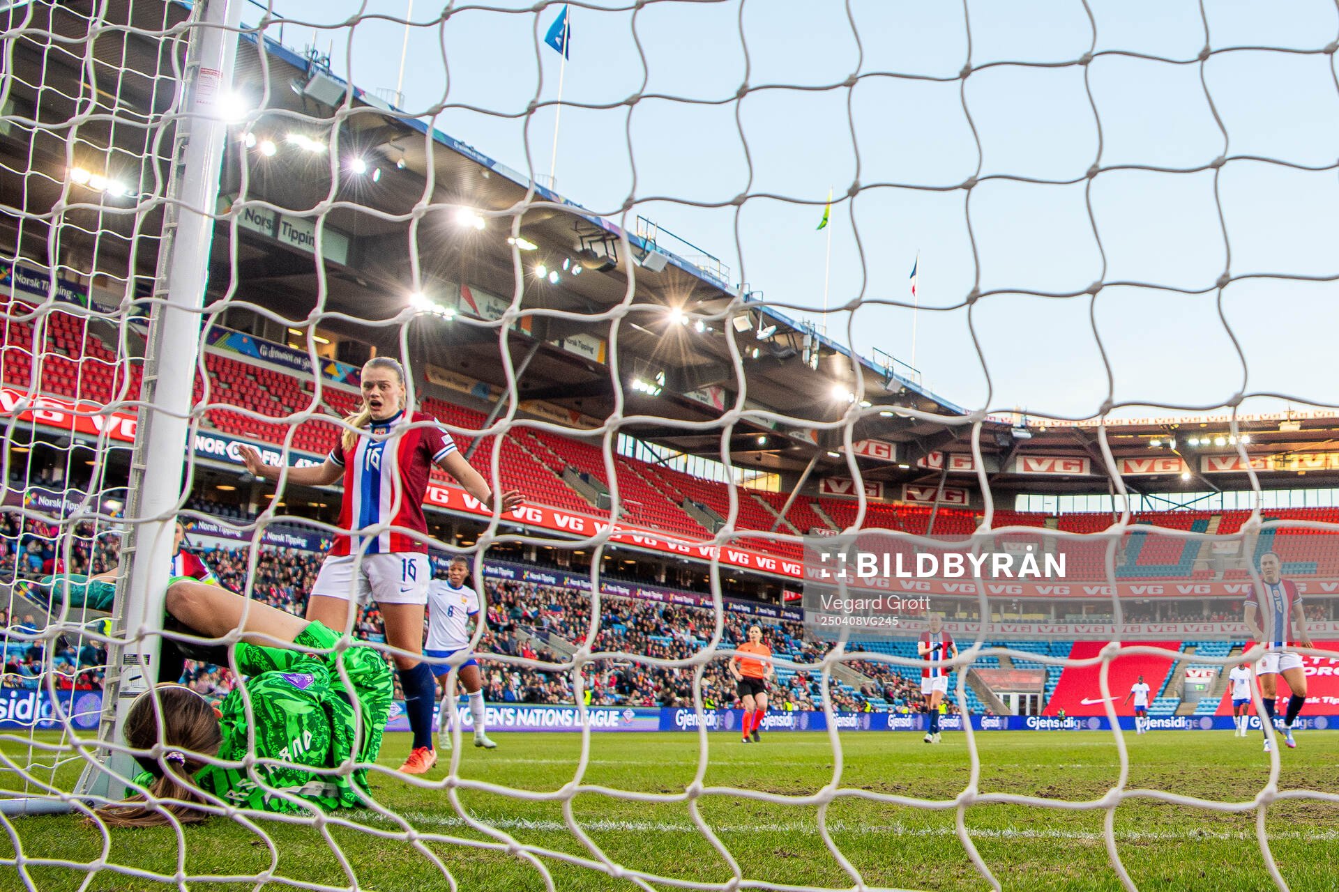 Mathilde Harviken of Norway reacts as goalkeeper Cecilie Fiskerstrand crashes into the goalpost during the UEFA Women’s Nations League football match between Norway and France on April 8, 2025 in Oslo.
