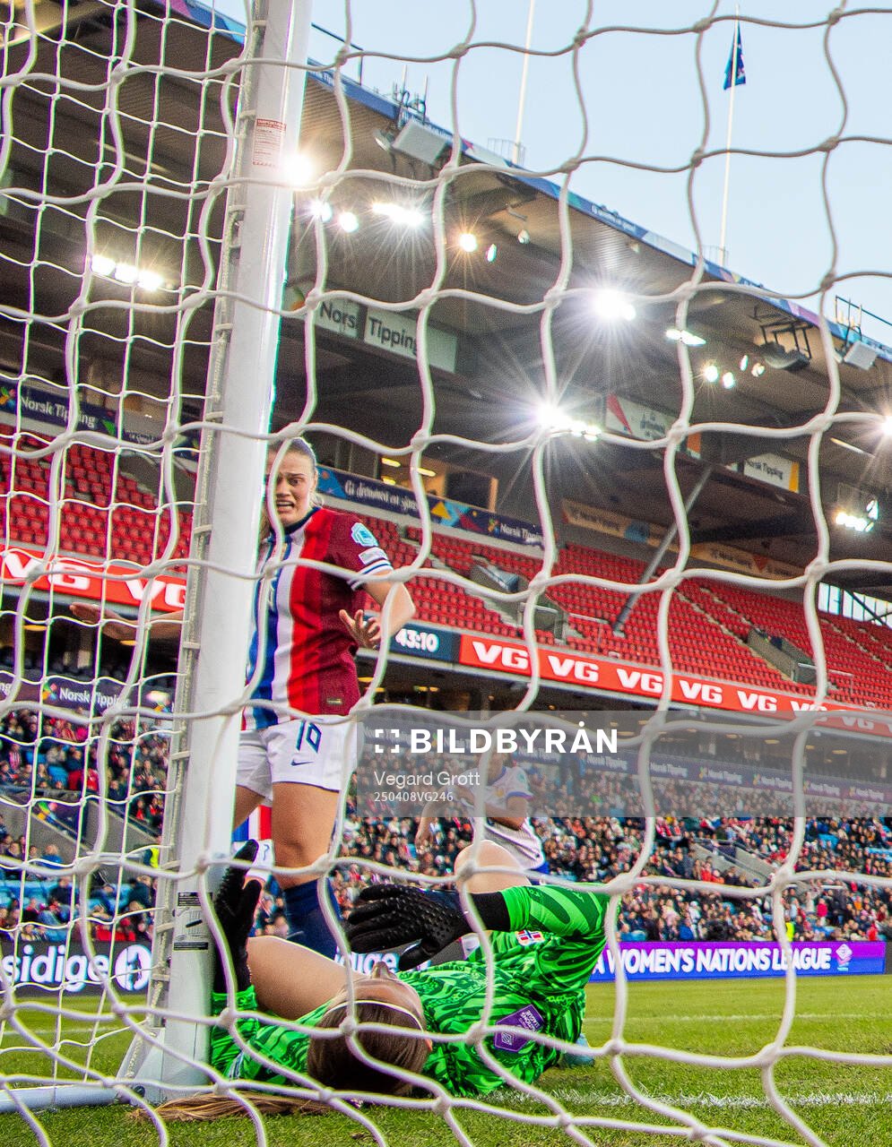 Mathilde Harviken of Norway reacts as goalkeeper Cecilie