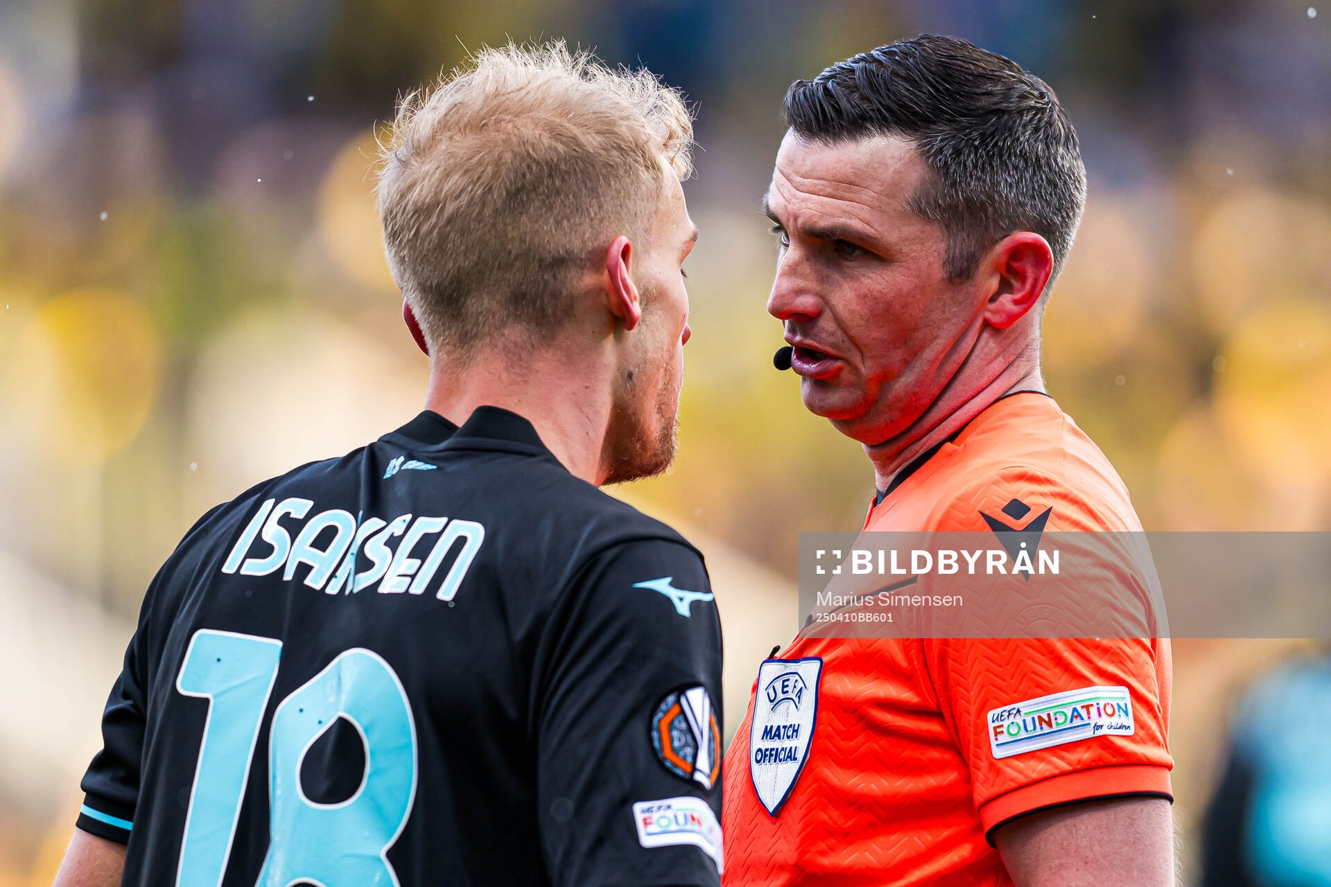 Gustav Isaksen of Lazio and Michael Oliver, referee, during the UEFA Europa League quarter-final football match between Bodø/Glimt and Lazio on April 10, 2025 in Bodø.