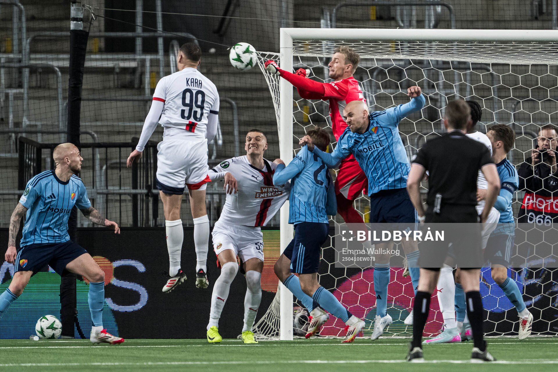 Goalkeeper Jacob Rinne of Djurgården and Ercan Kara and