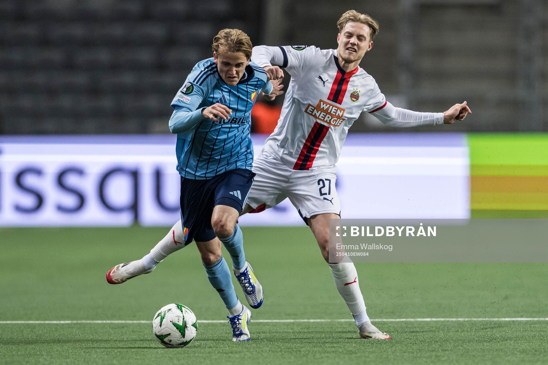 Oskar Fallenius of Djurgården and Noah Bischof of Rapid Wien during the UEFA Conference League quarterfinal between Djurgården and Rapid Wien on April 10, 2025 in Stockholm.