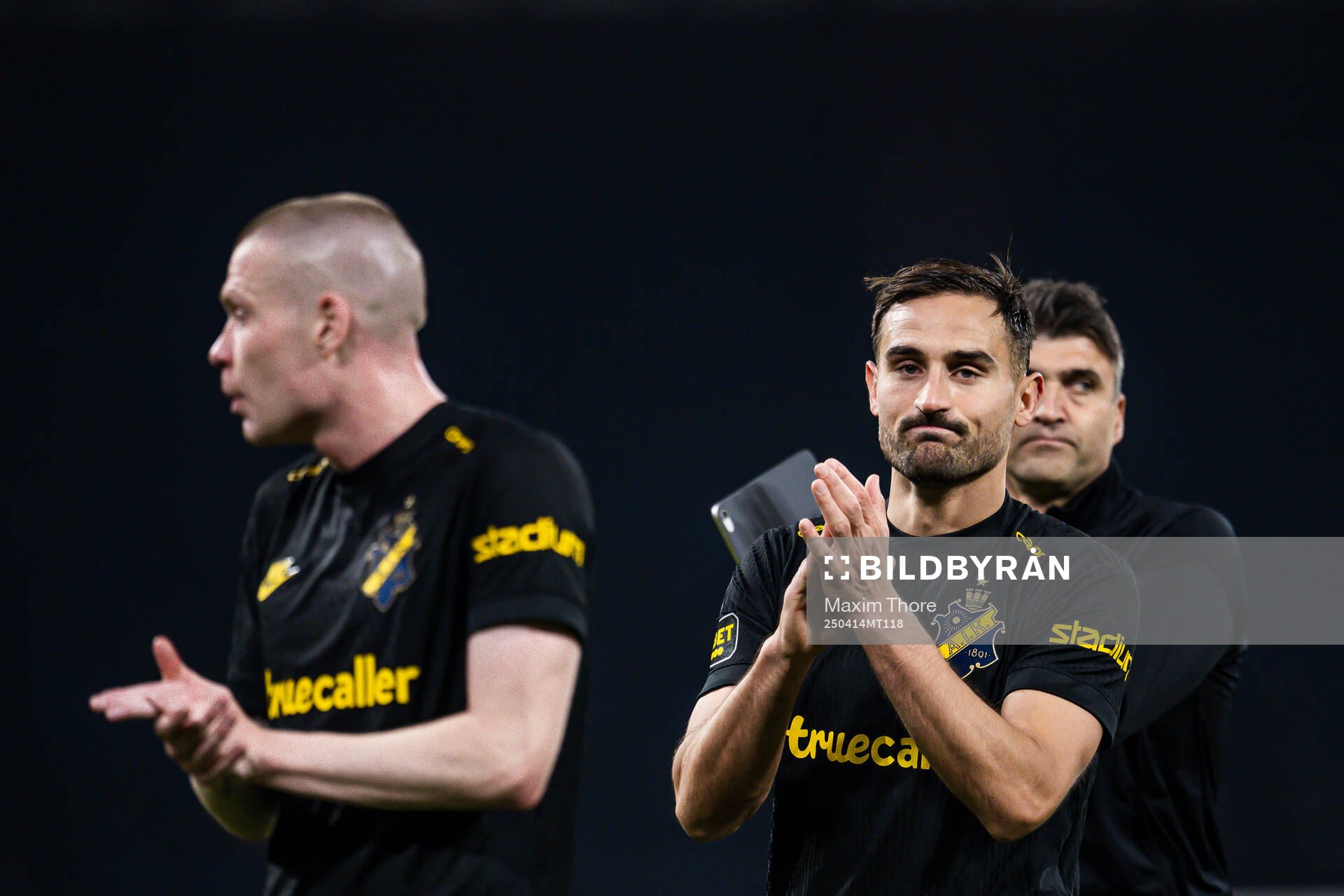 AIKs Thomas Poppler Isherwood och Sotirios Papagiannopoulos efter fotbollsmatchen i Allsvenskan mellan AIK och Malmö FF den 14 april 2025 i Stockholm.