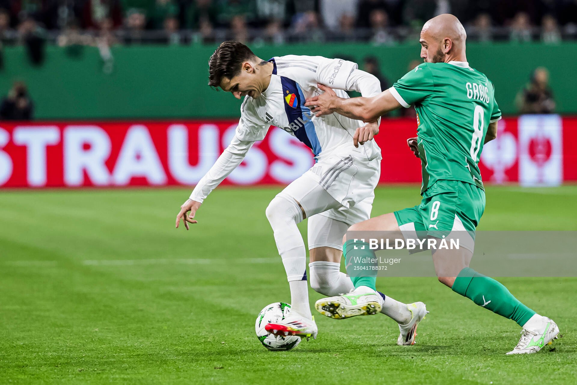 Nino Zugelj of Djurgården and Lukas Grgic of Rapid Wien