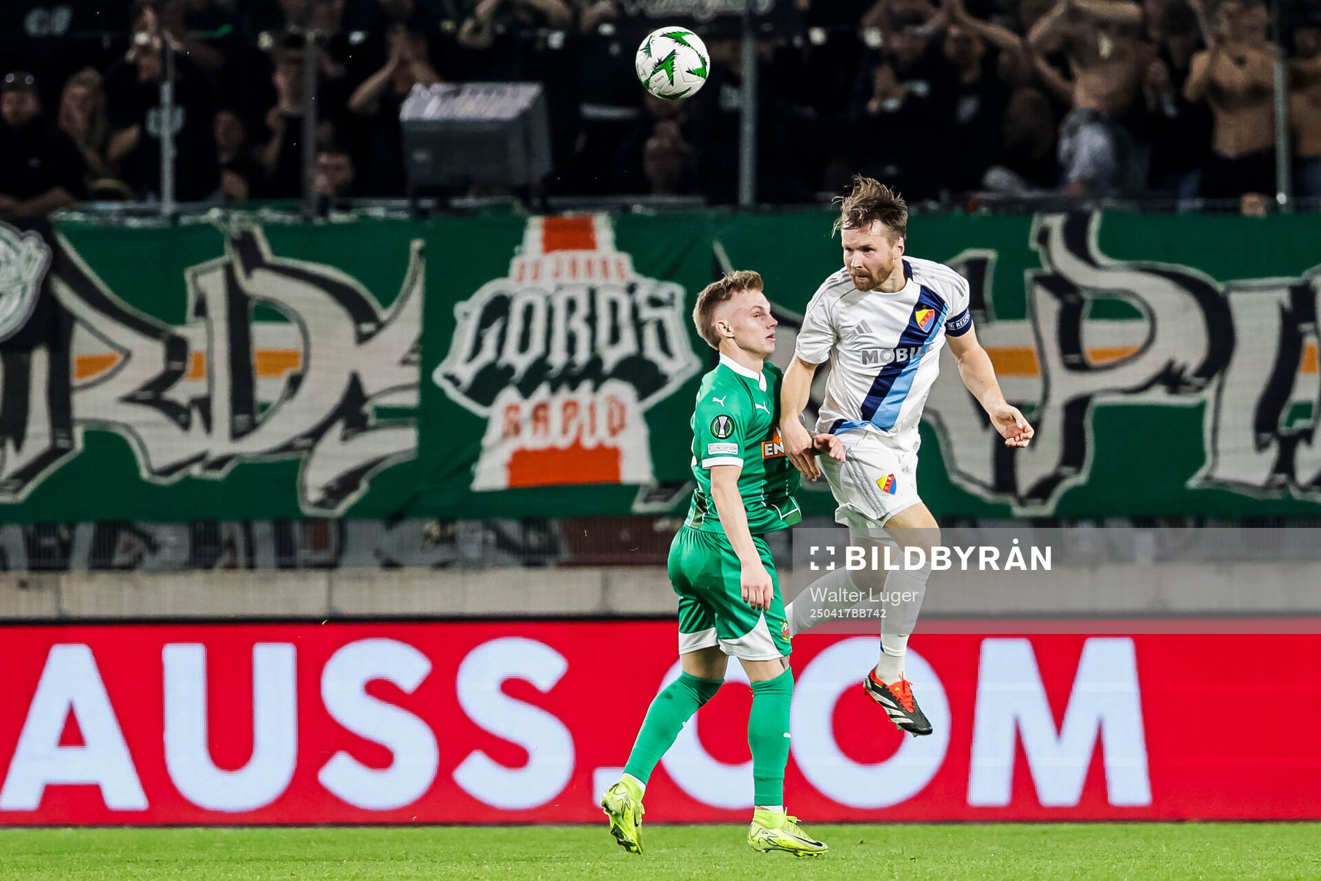 Isak Jansson of Rapid Wien and Jacob Une of Djurgården