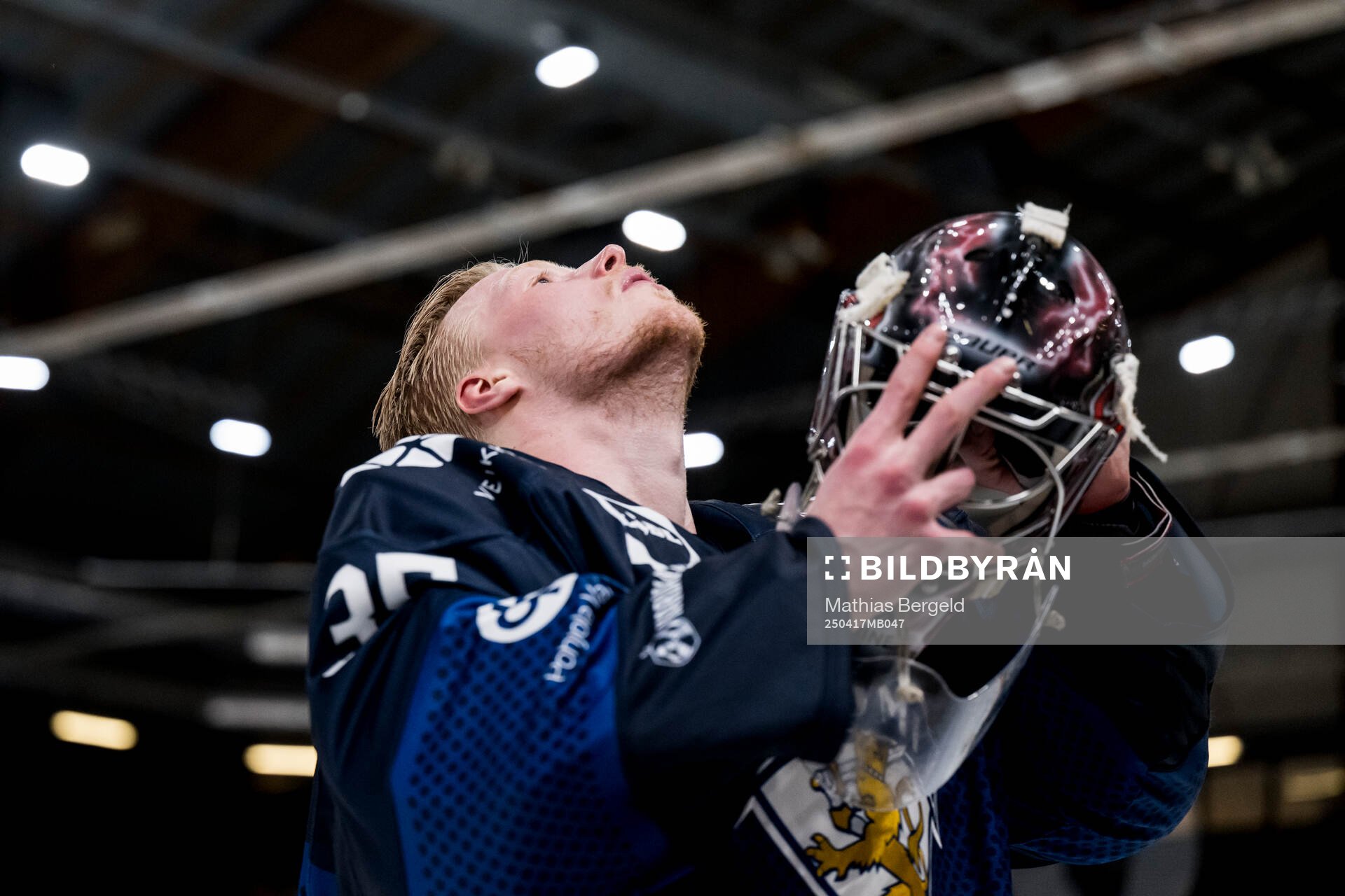Goaltender Oskari Salminen of Finland
