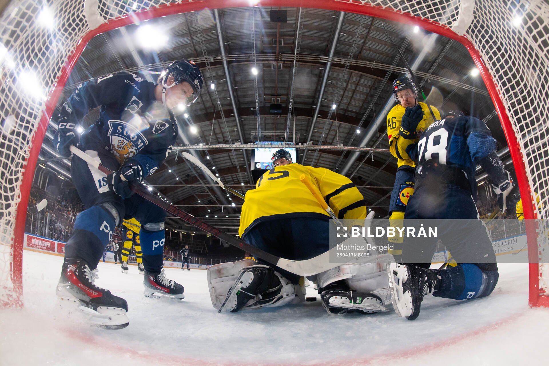 Patrik Puistola and Tommi Tikka of Finland compete for the