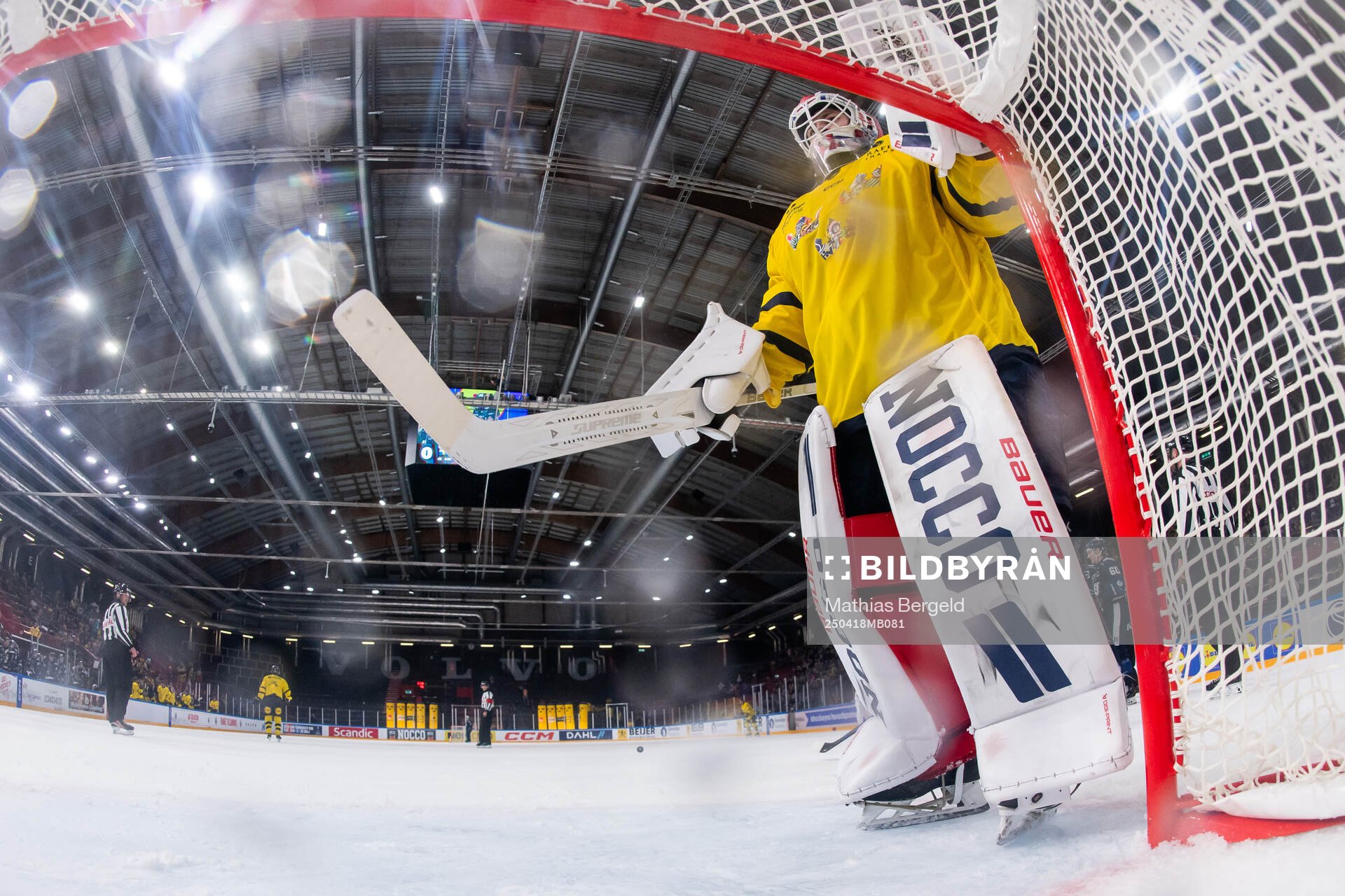 Goaltender Tim Juel of Sweden looks dejected