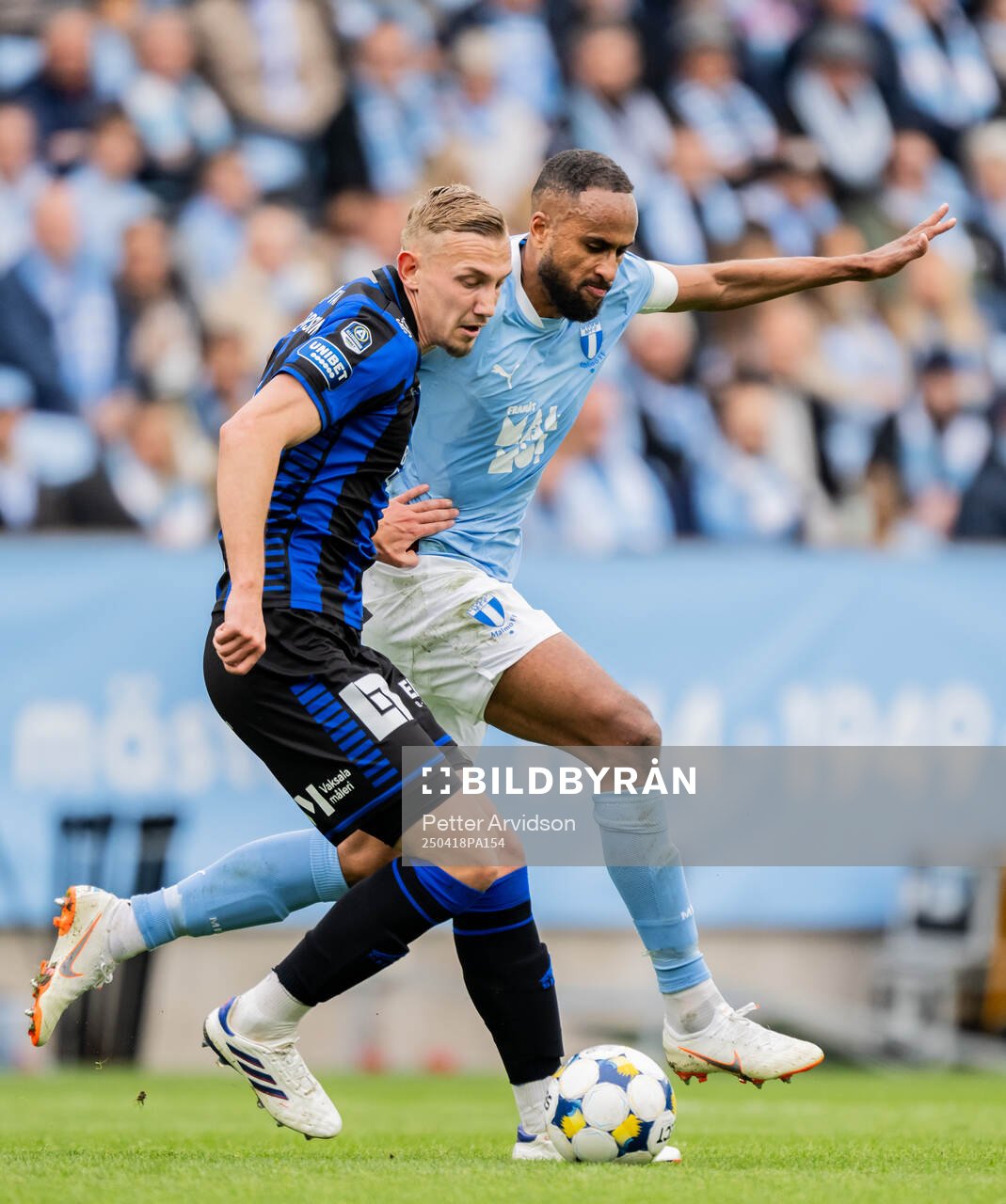 Sirius Jakob Voelkerling Persson och Malmö FFs Isaac Kiese