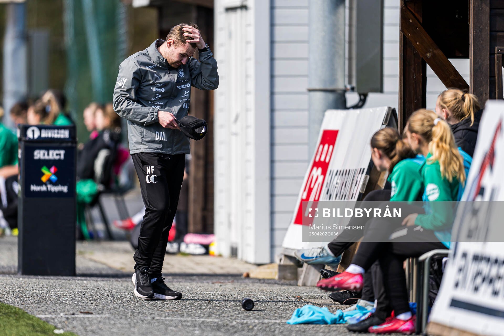 Nathan Flight, head coach of HamKam, looks dejected