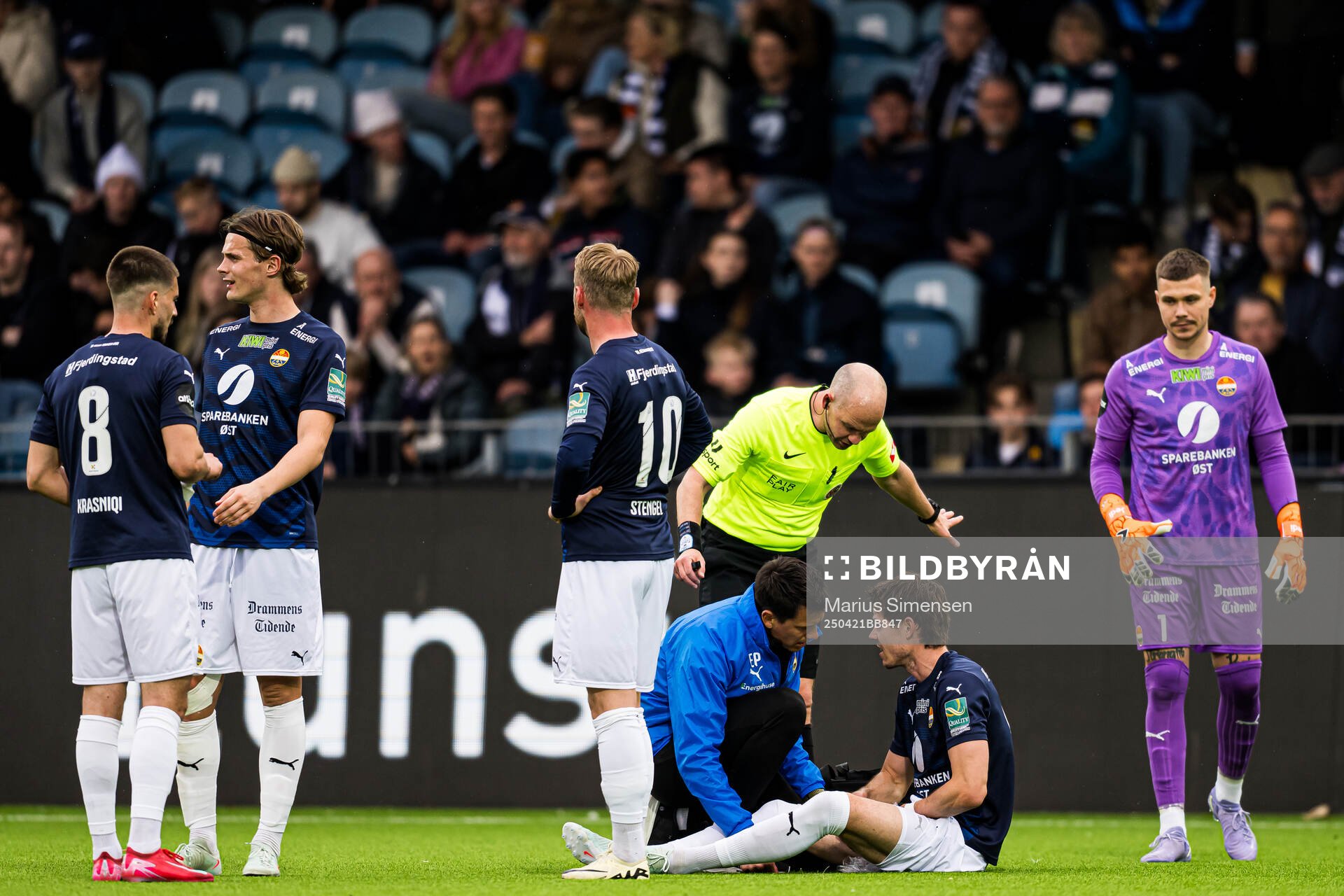 Lars-Christopher Vilsvik of Strømsgodset with an injury