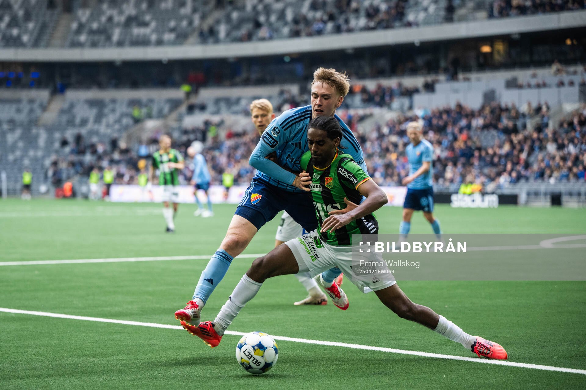 Djurgårdens Santeri Haarala och GAIS Harun Ibrahim under fotbollsmatchen i Allsvenskan mellan Djurgården och GAIS den 21 april 2025 i Stockholm.