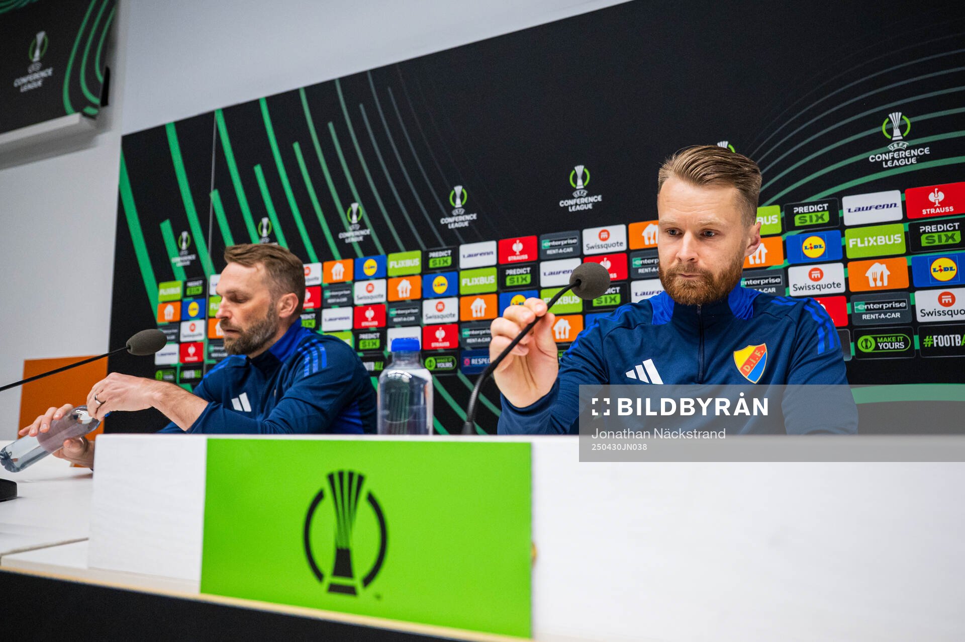 Head coach Jani Honkavaara and Jacob Une of Djurgården during a UEFA Conference League press conference on April 30, 2025 in Stockholm.
