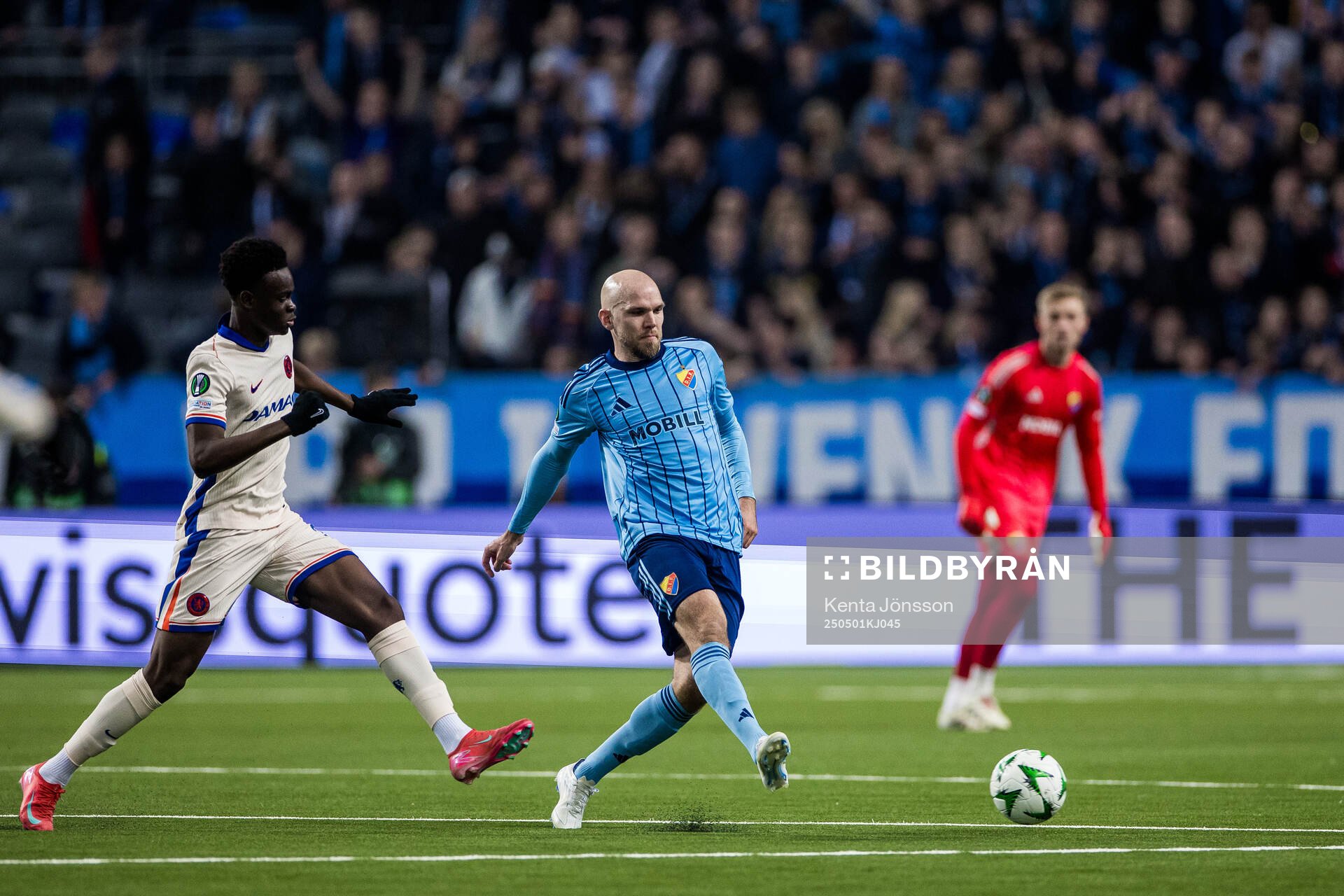 Joshua Acheampong of Chelsea and Marcus Danielson of Djurgården during the UEFA Conference League semifinal between Djurgården and Chelsea on May 1, 2025 in Stockholm.