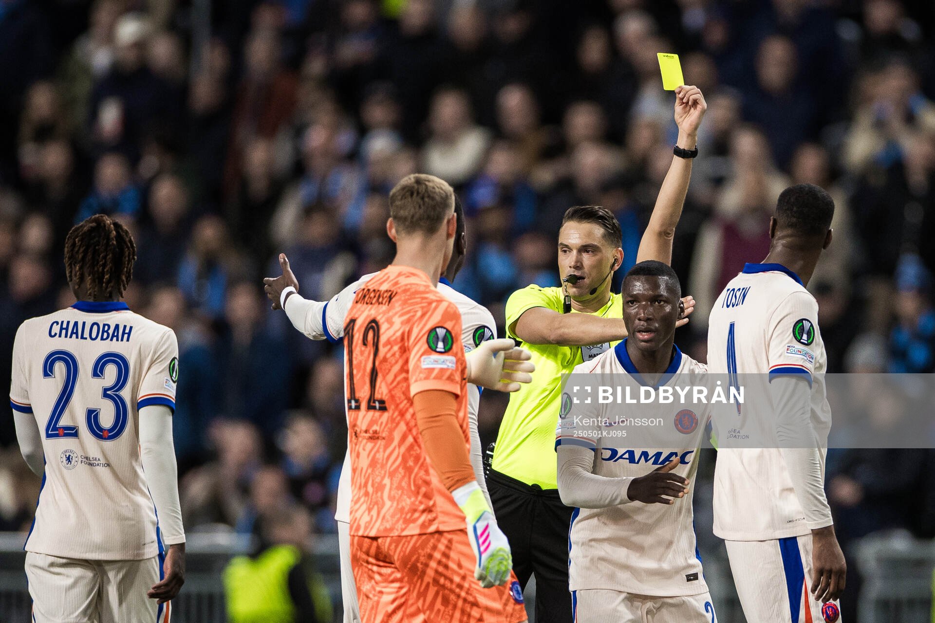 Tosin Adarabioyo of Chelsea receives a yellow card