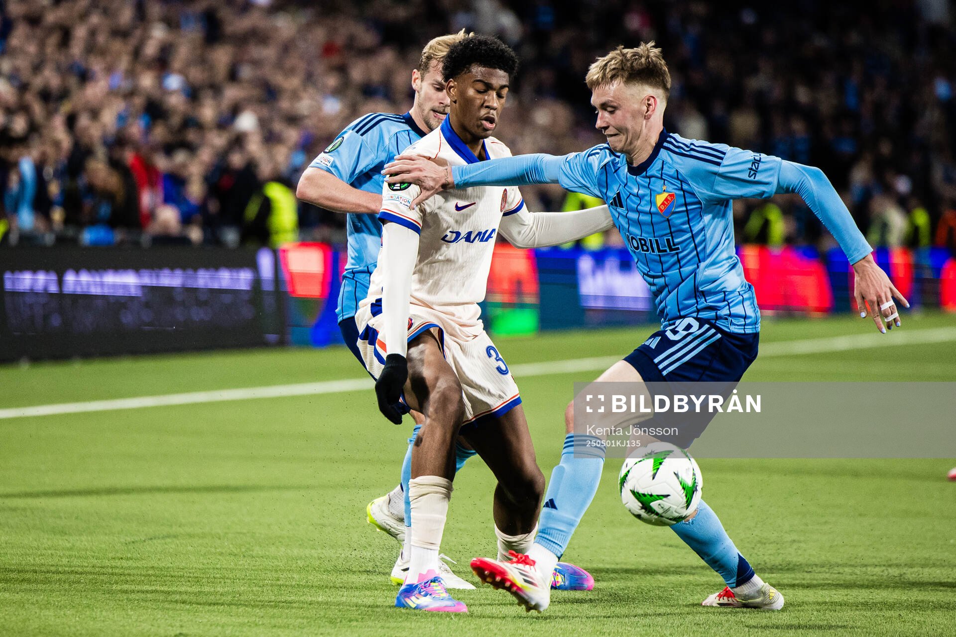 Joshua Acheampong of Chelsea and Santeri Haarala of Djurgården during the UEFA Conference League semifinal between Djurgården and Chelsea on May 1, 2025 in Stockholm.