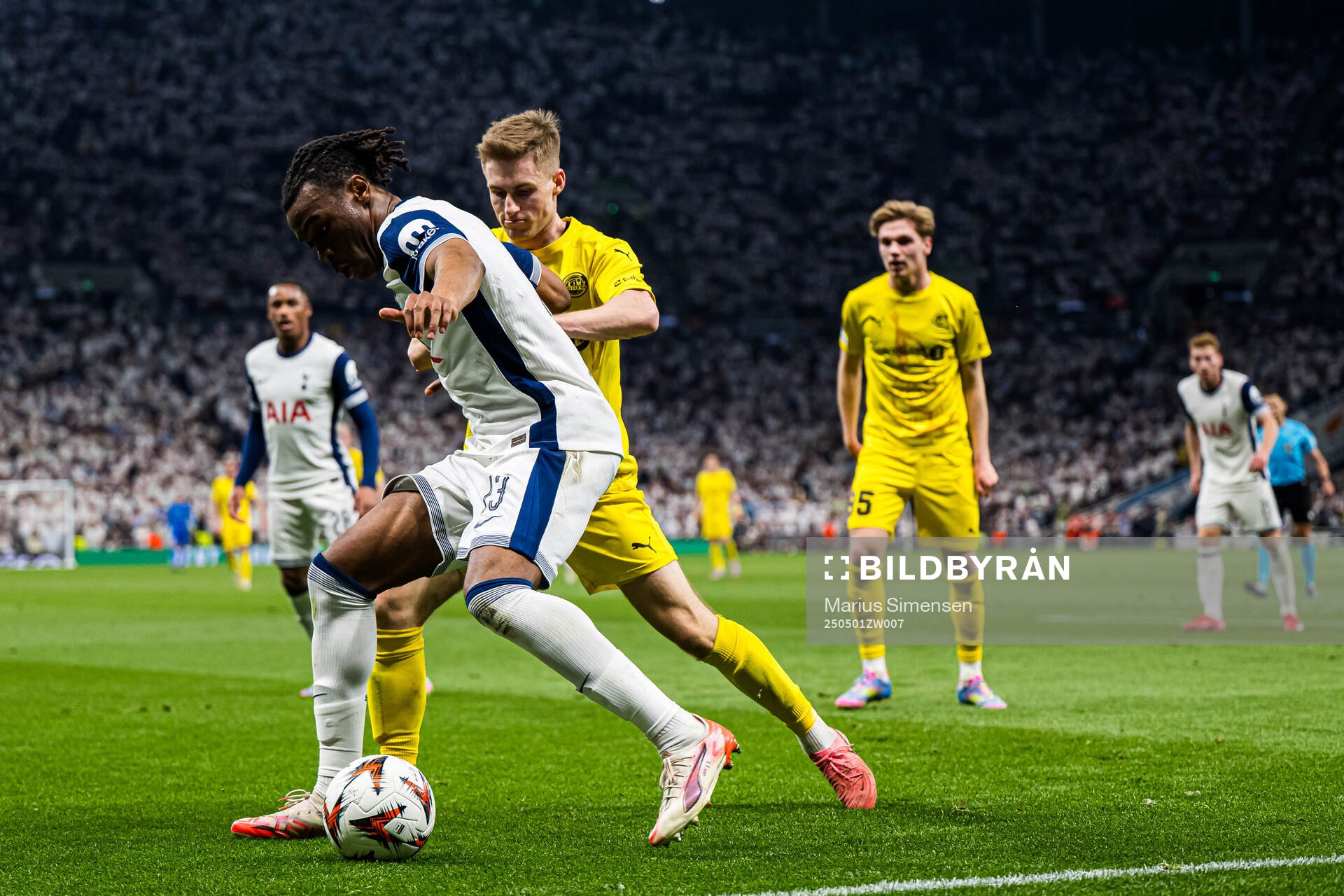 Destiny Udogie of Tottenham and Fredrik Sjøvold of Bodø/Glimt during the UEFA Europa League semi-final football match between Tottenham and Bodø/Glimt on May 1, 2025 in London.