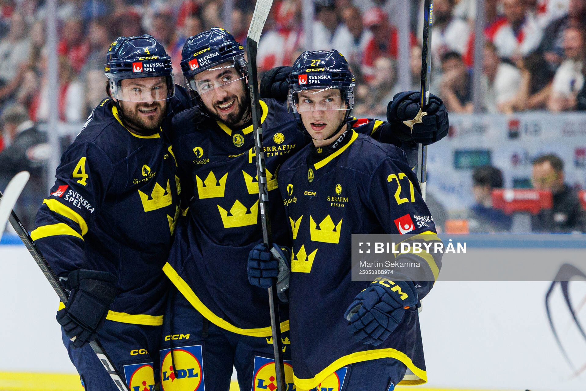 Mika Zibanejad of Sweden celebrates with Rasmus Andersson