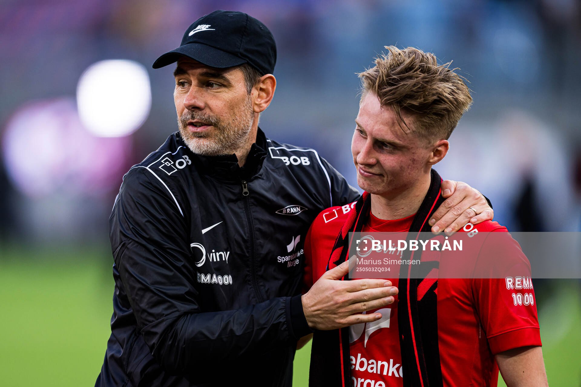 Freyr Alexandersson, head coach of Brann, and Lars Bjørnerud Remmem of Brann after the Eliteserien match between Rosenborg and Molde on May 3, 2025 in Oslo.