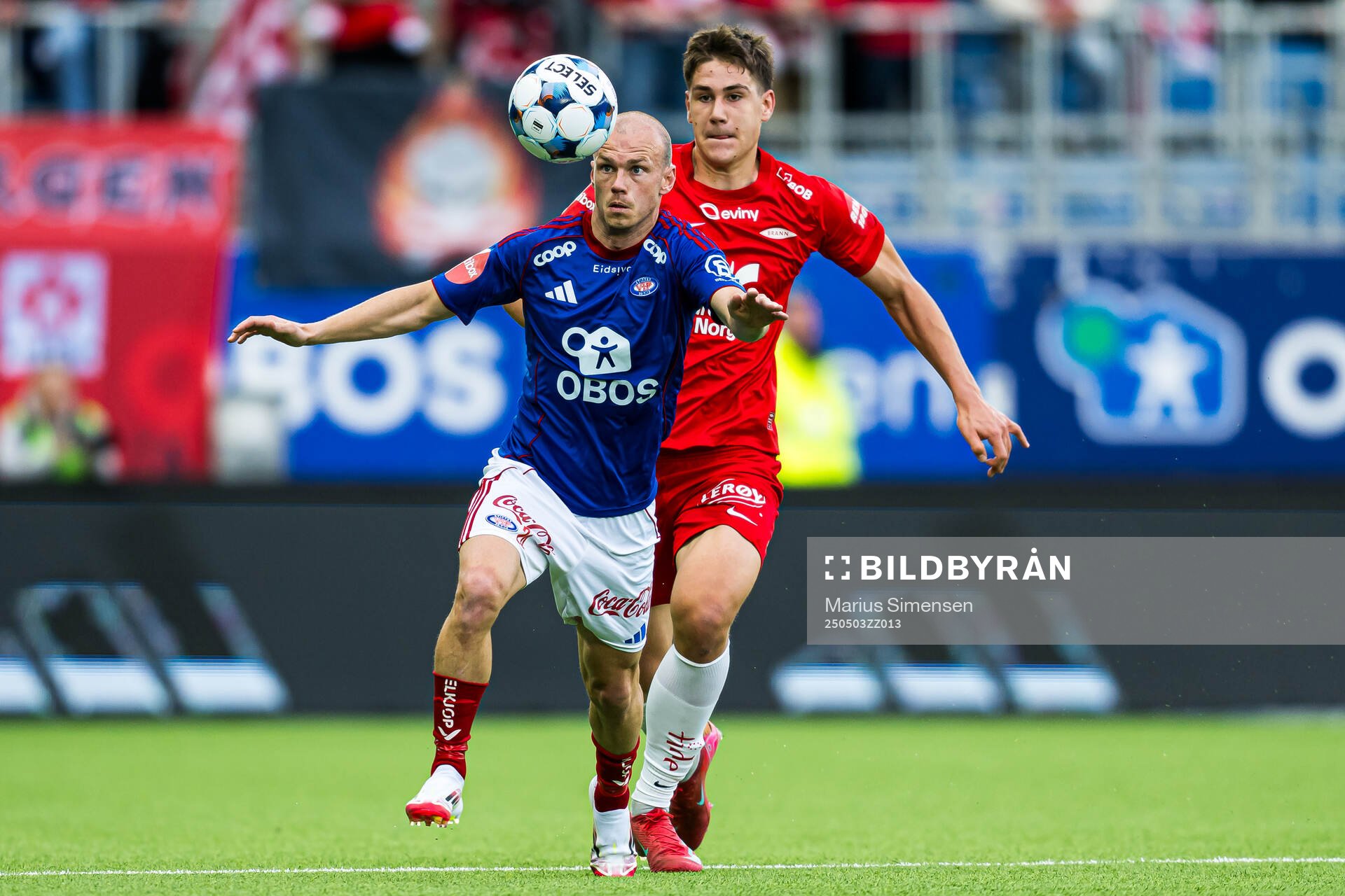 Petter Dahle Strand of Vålerenga and Eivind Helland of Brann during the Eliteserien match between Rosenborg and Molde on May 3, 2025 in Oslo.