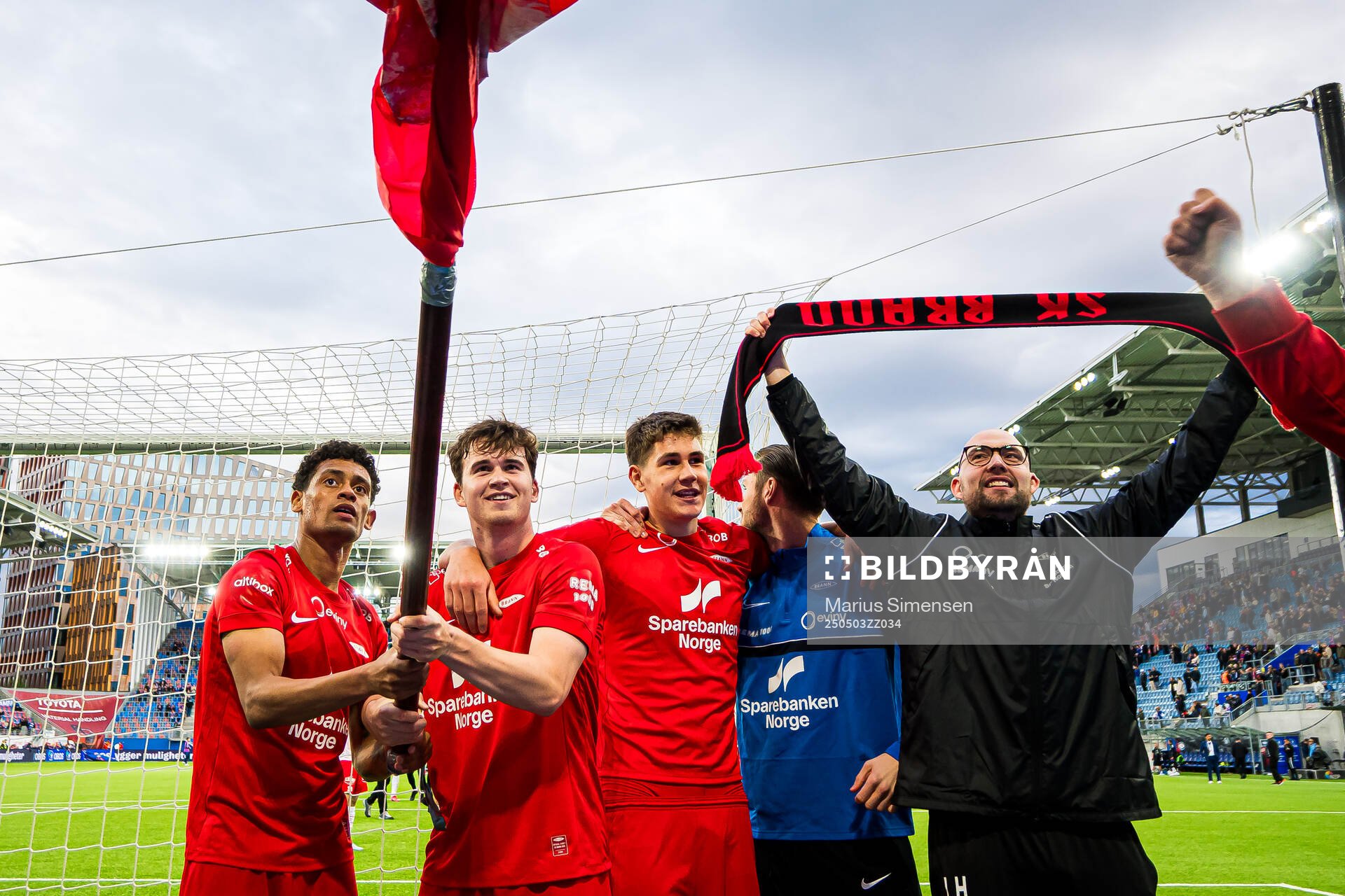 Japhet Sery Larsen, Mads Hansen, Eivind Helland and Jonathan Hartmann, assistant coach of Brann, celebrates after the Eliteserien match between Rosenborg and Molde on May 3, 2025 in Oslo.