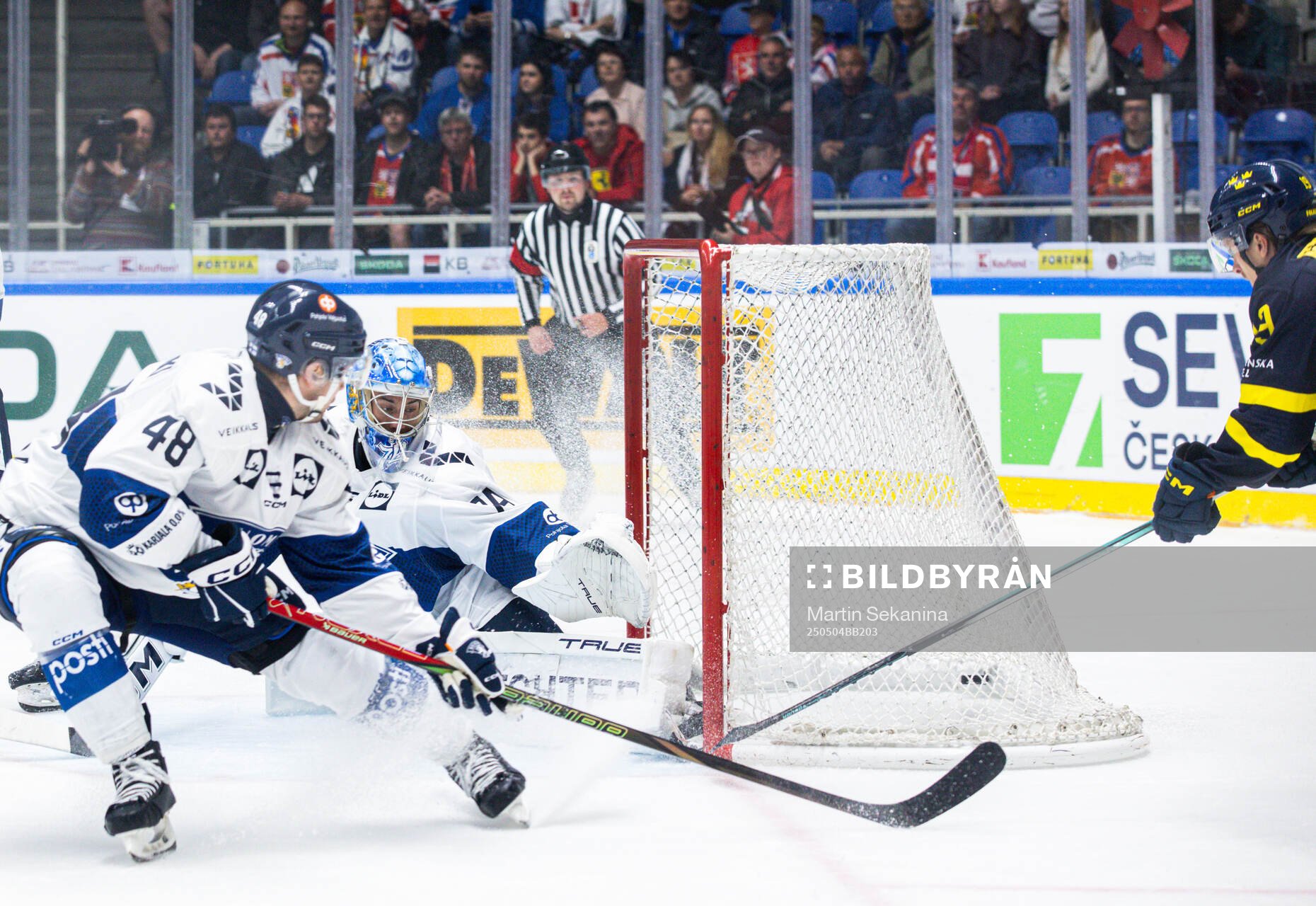 Marcus Sörensen of Sweden scores the 1-1 goal behind Juuse