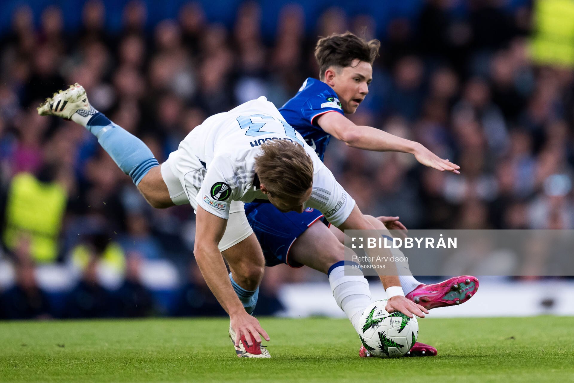 Daniel Stensson of Djurgården and Reggie Walsh of Chelsea during the UEFA Conference League semifinal second leg match between Chelsea and Djurgården on May 8, 2025 in London.