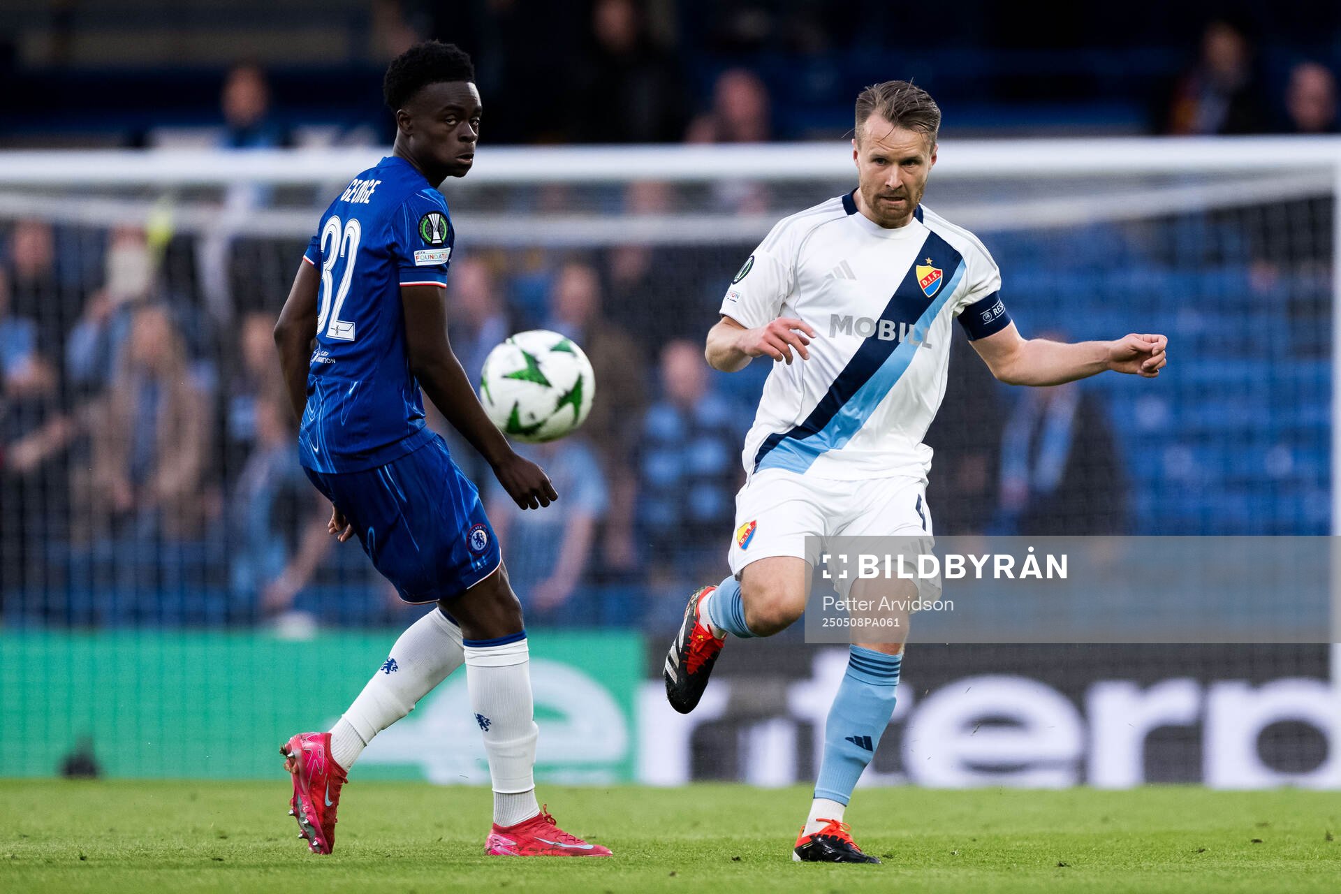 Tyrique George of Chelsea and Jacob Une of Djurgården during the UEFA Conference League semifinal second leg match between Chelsea and Djurgården on May 8, 2025 in London.