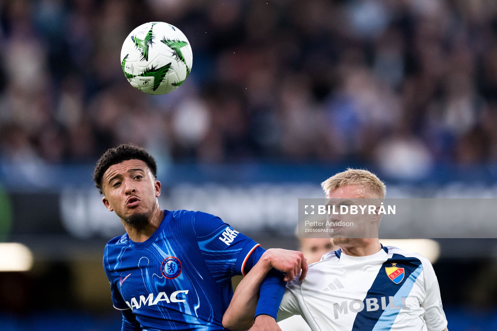 Jadon Sancho of Chelsea and Viktor Bergh of Djurgården during the UEFA Conference League semifinal second leg match between Chelsea and Djurgården on May 8, 2025 in London.