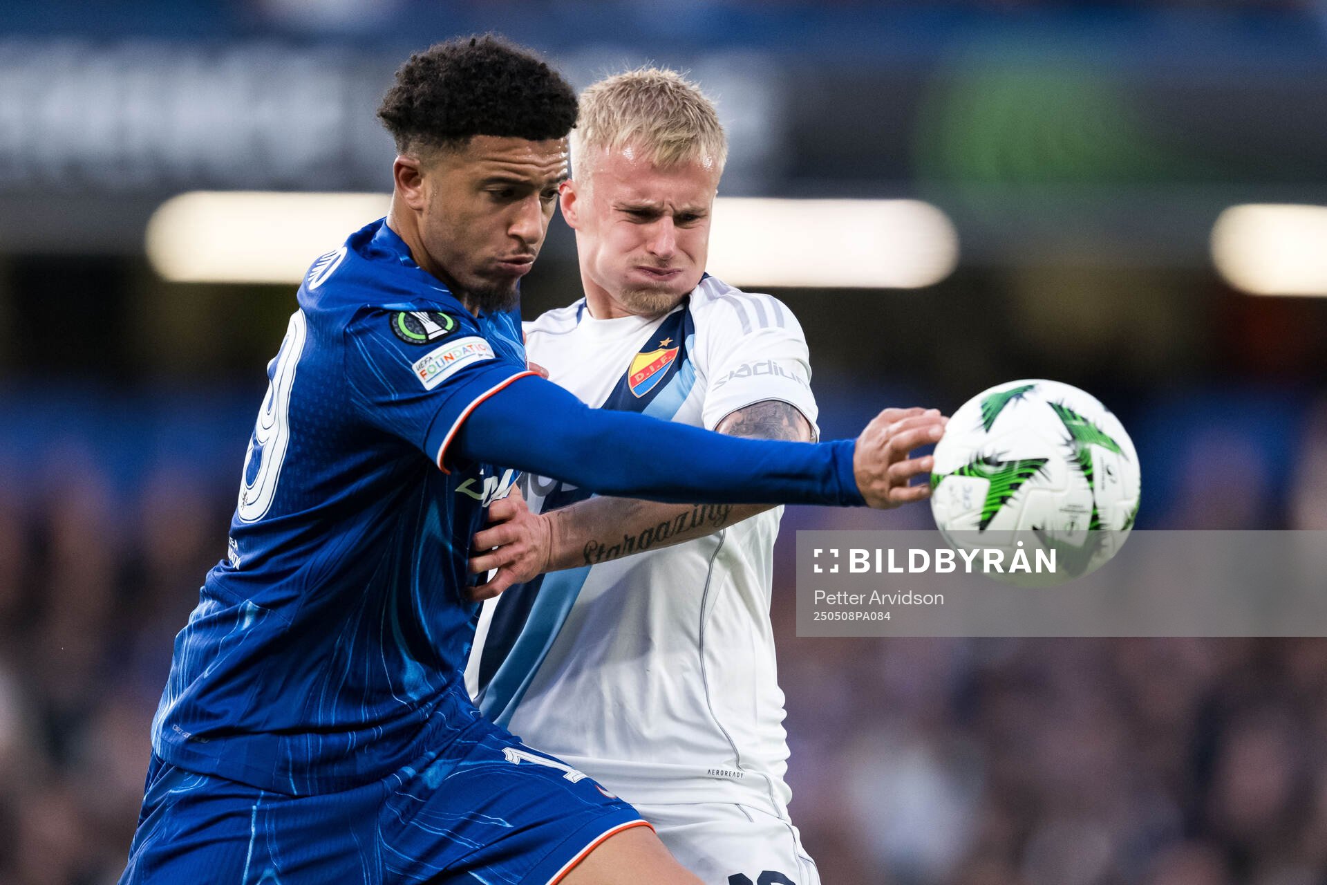 Jadon Sancho of Chelsea and Viktor Bergh of Djurgården during the UEFA Conference League semifinal second leg match between Chelsea and Djurgården on May 8, 2025 in London.