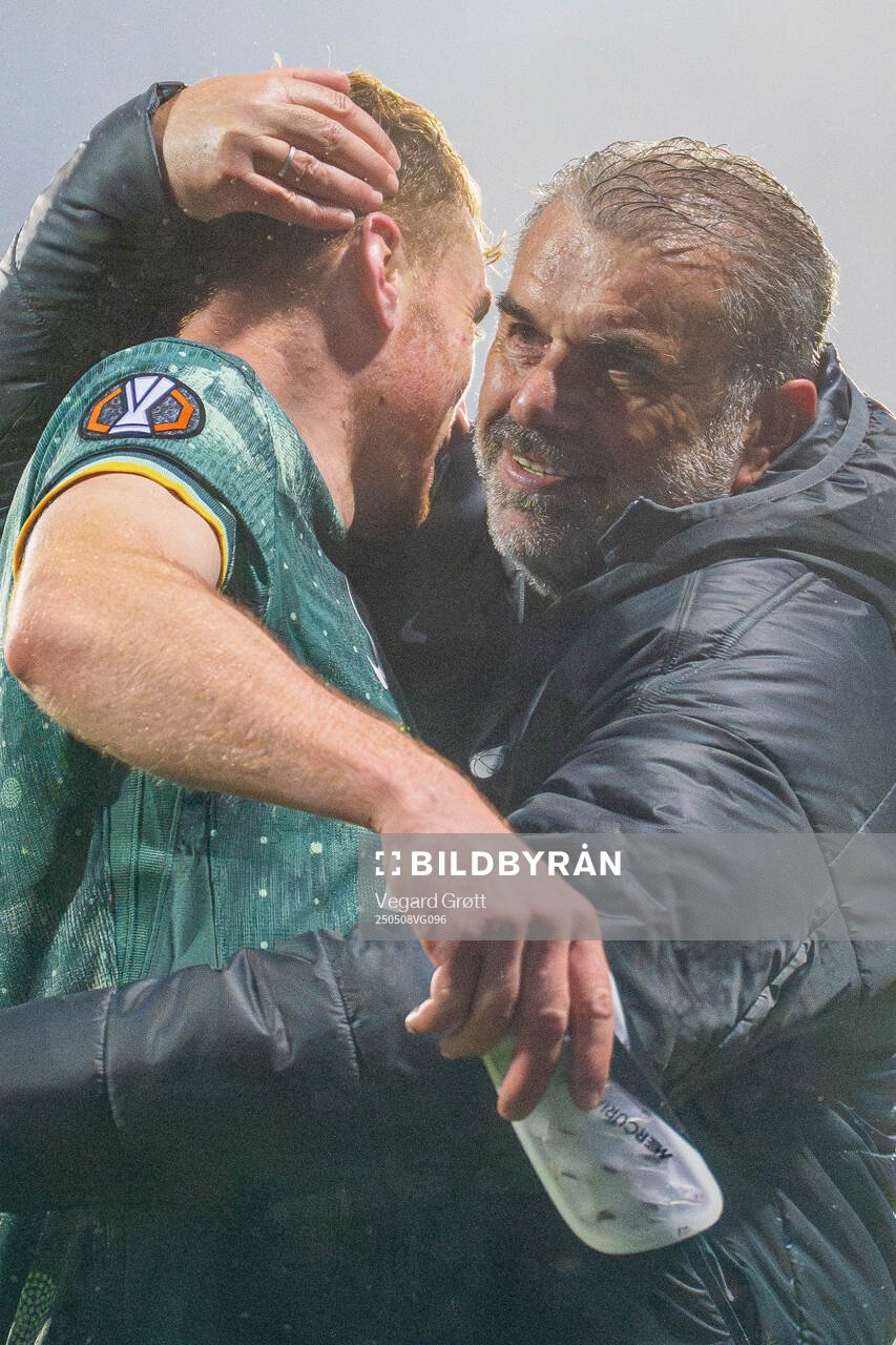 Dejan Kulusevski and head coach Ange Postecoglou of Tottenham Hotspur celebrate after the UEFA Europa League semi-final football match between Bodø/Glimt and Tottenham on May 8, 2025 in Bodø.