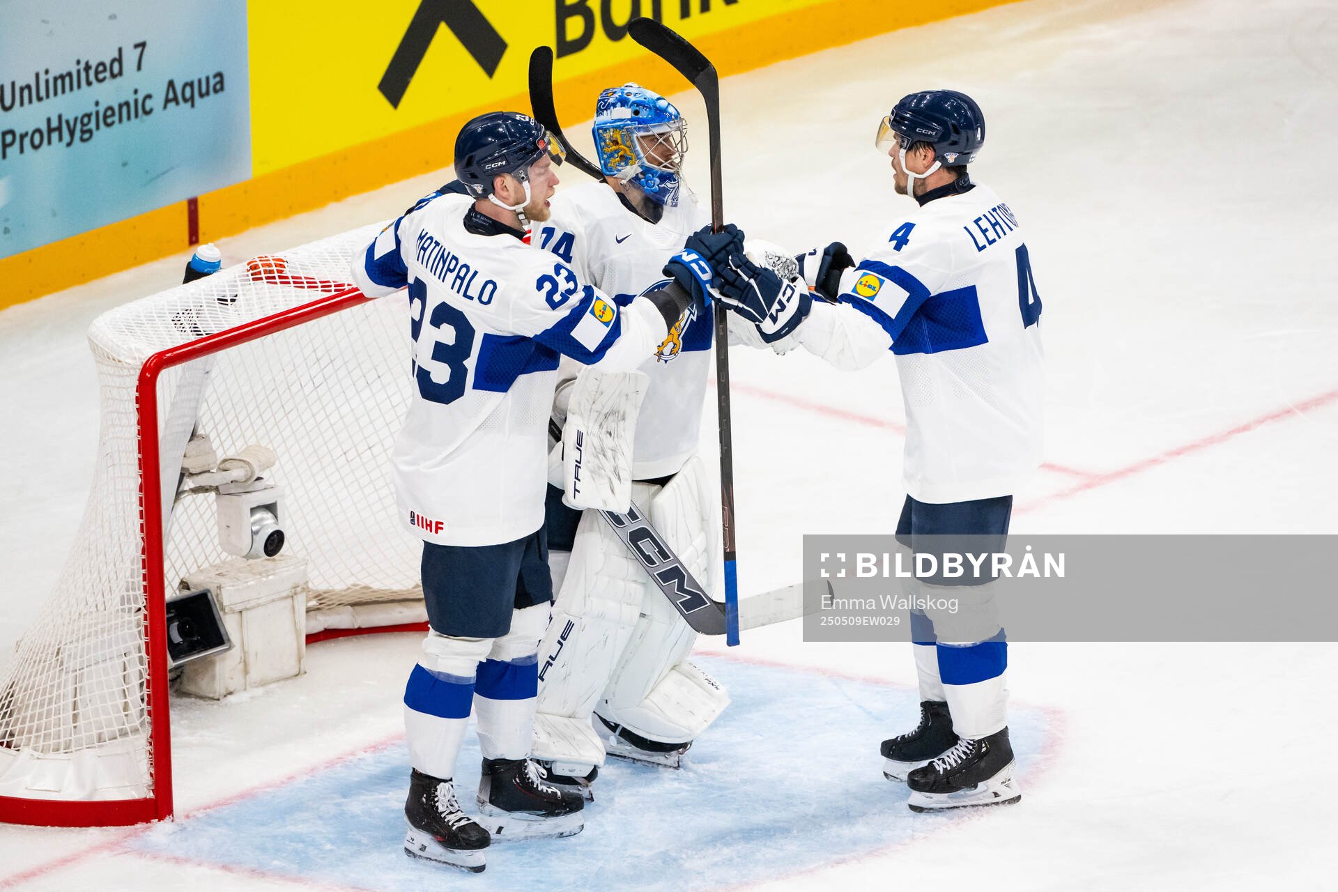 Nikolas Matinpalo, goaltender Juuse Saros and Mikko