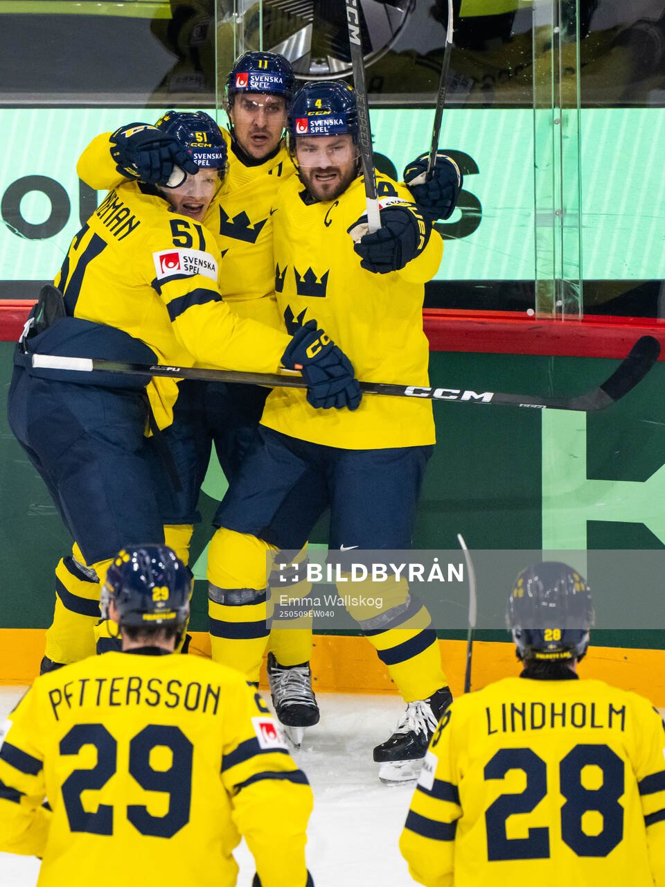 Emil Heineman, Mikael Backlund and Rasmus Andersson of