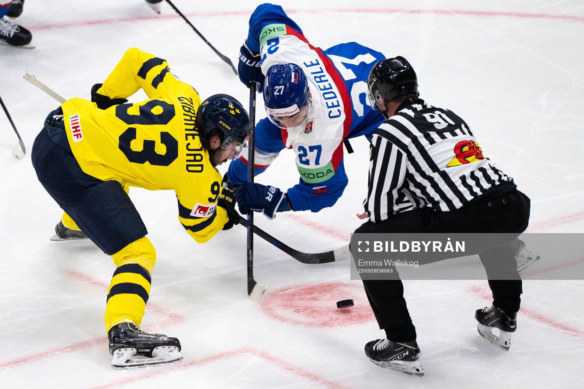 Mika Zibanejad of Sweden and Sebastian Cederle of Slovakia
