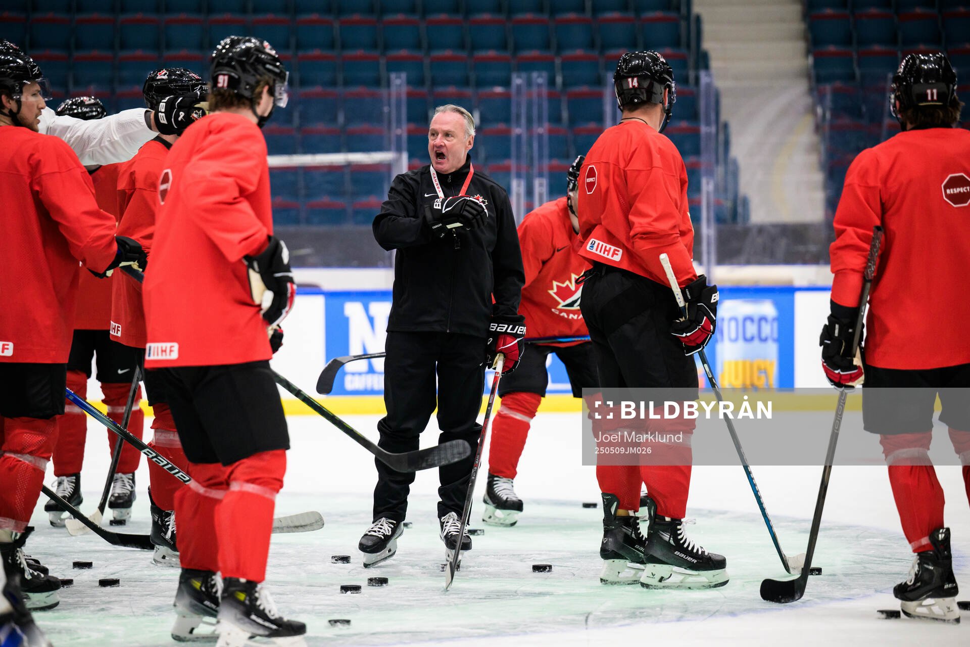 Head coach Dean Evason of Canada at a practice session