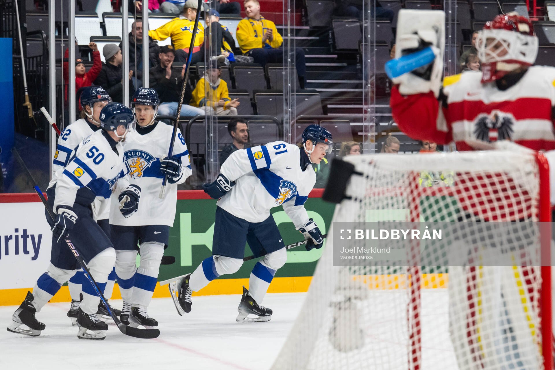 Juuso Pärssinen of Finland celebrates with team mates
