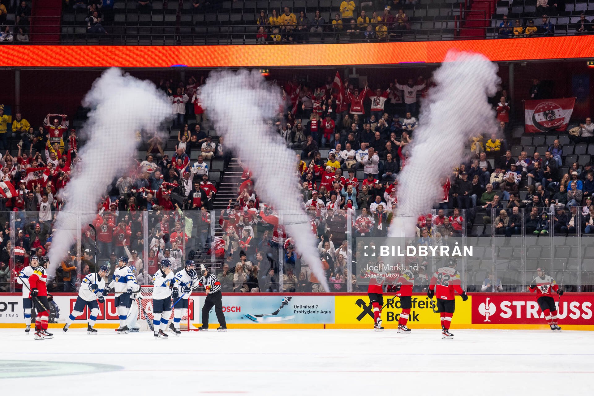 Bernd Wolf of Austria (right) celebrates