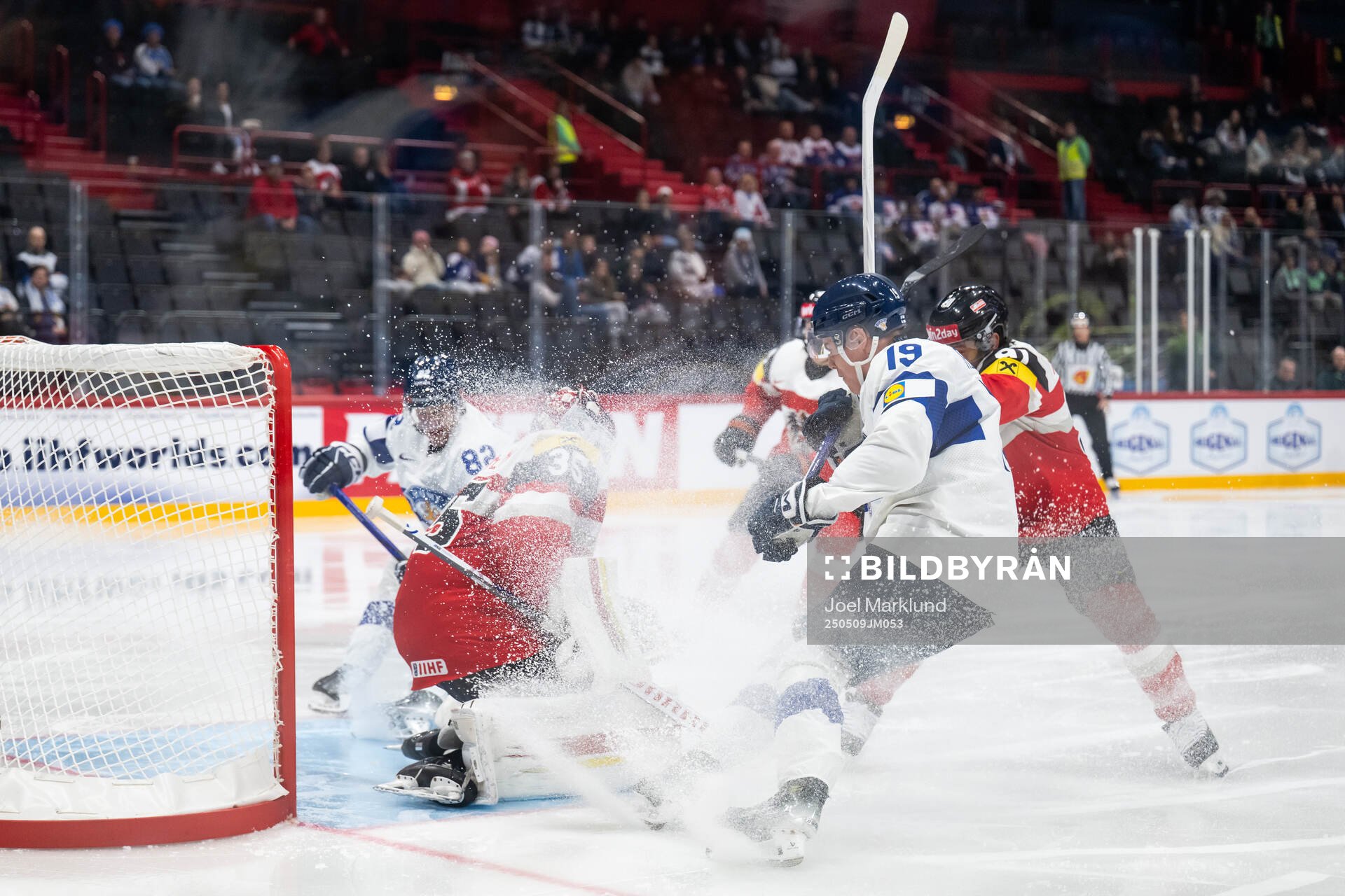 Goaltender Atte Tolvanen of Austria and Waltteri Merelä of
