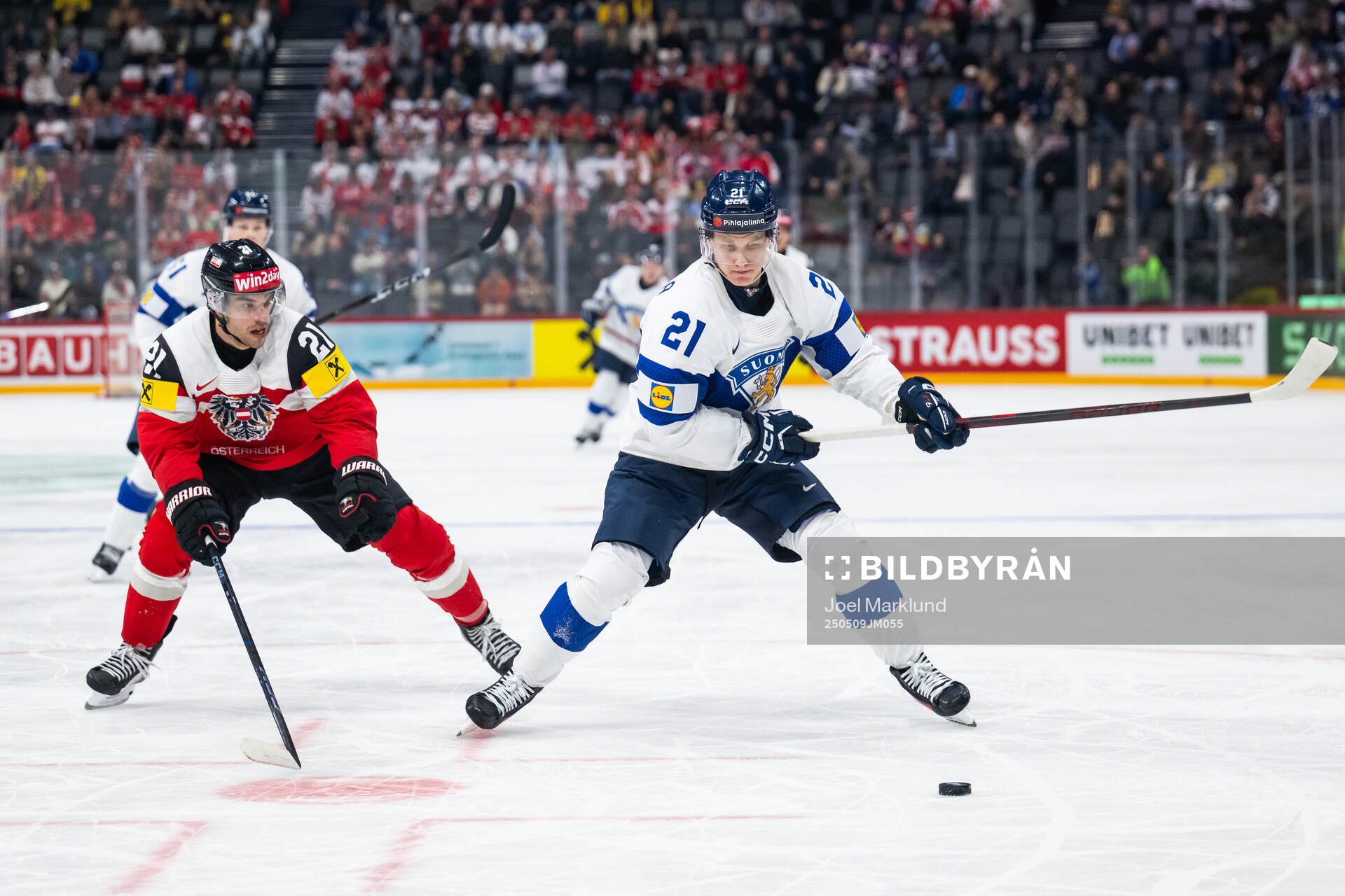 Lukas Haudum of Austria and Patrik Puistola of Finland