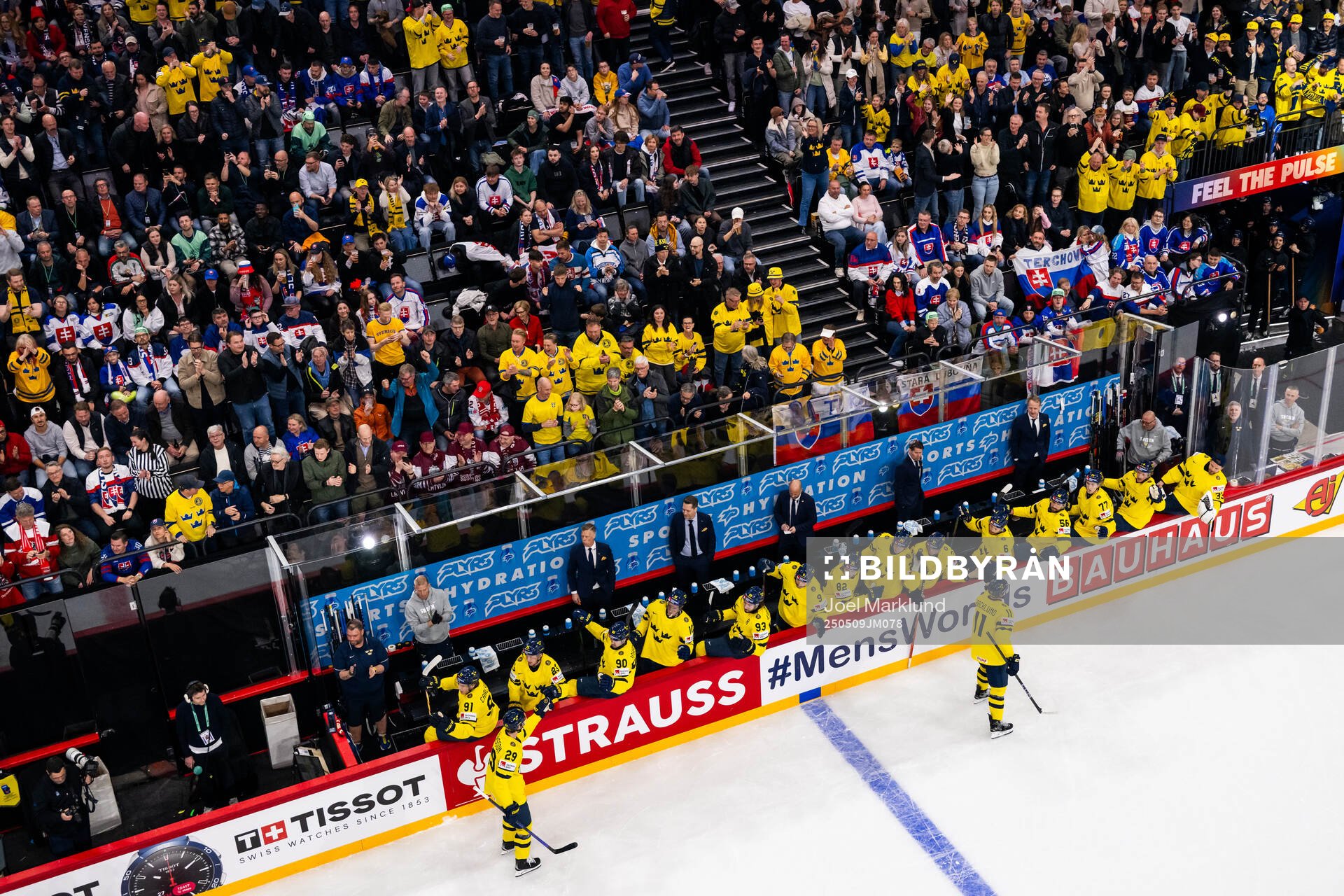 Marcus Pettersson and Mikael Backlund of Sweden celebrate