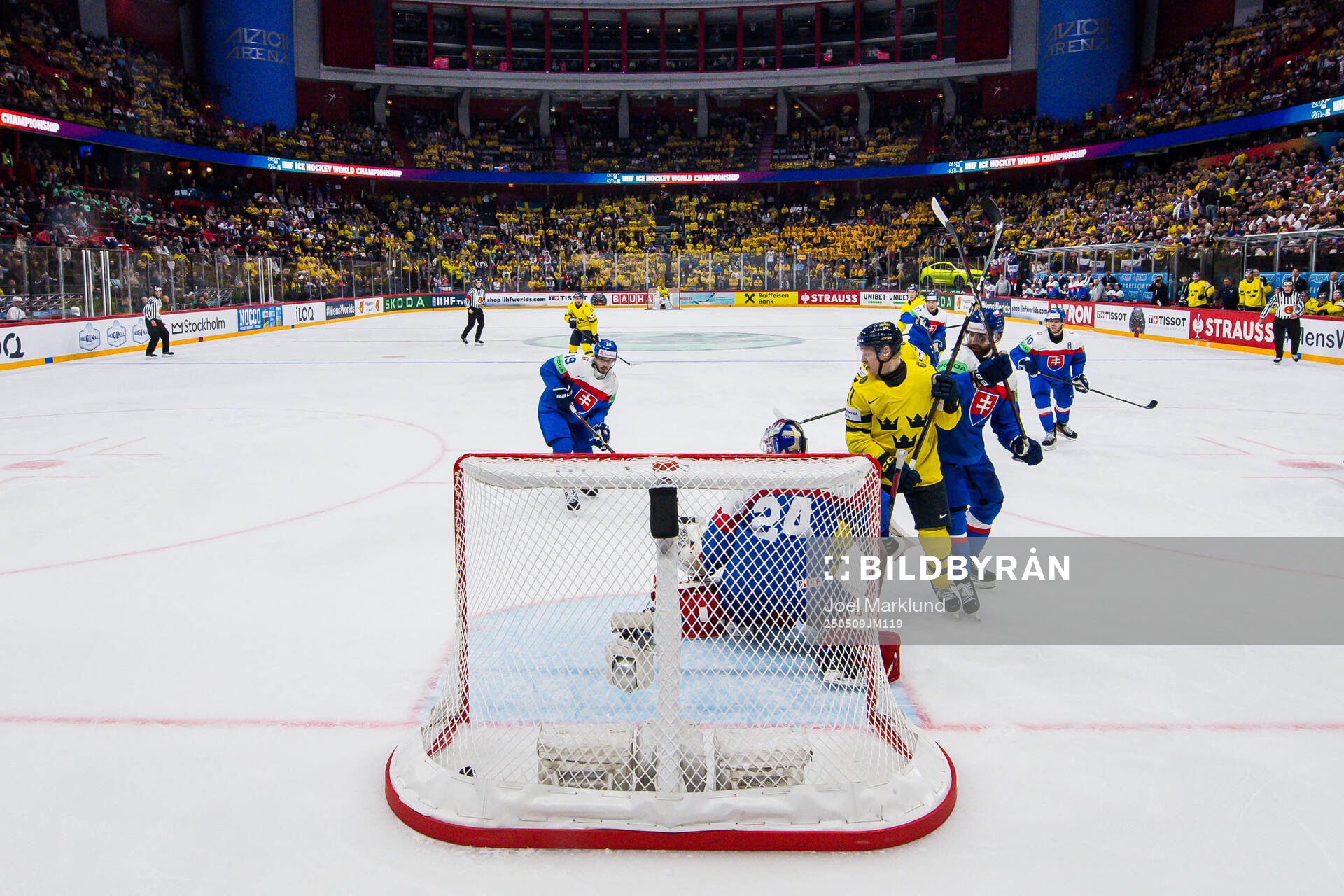 Emil Heineman of Sweden sees goaltender Patrik Rybar of