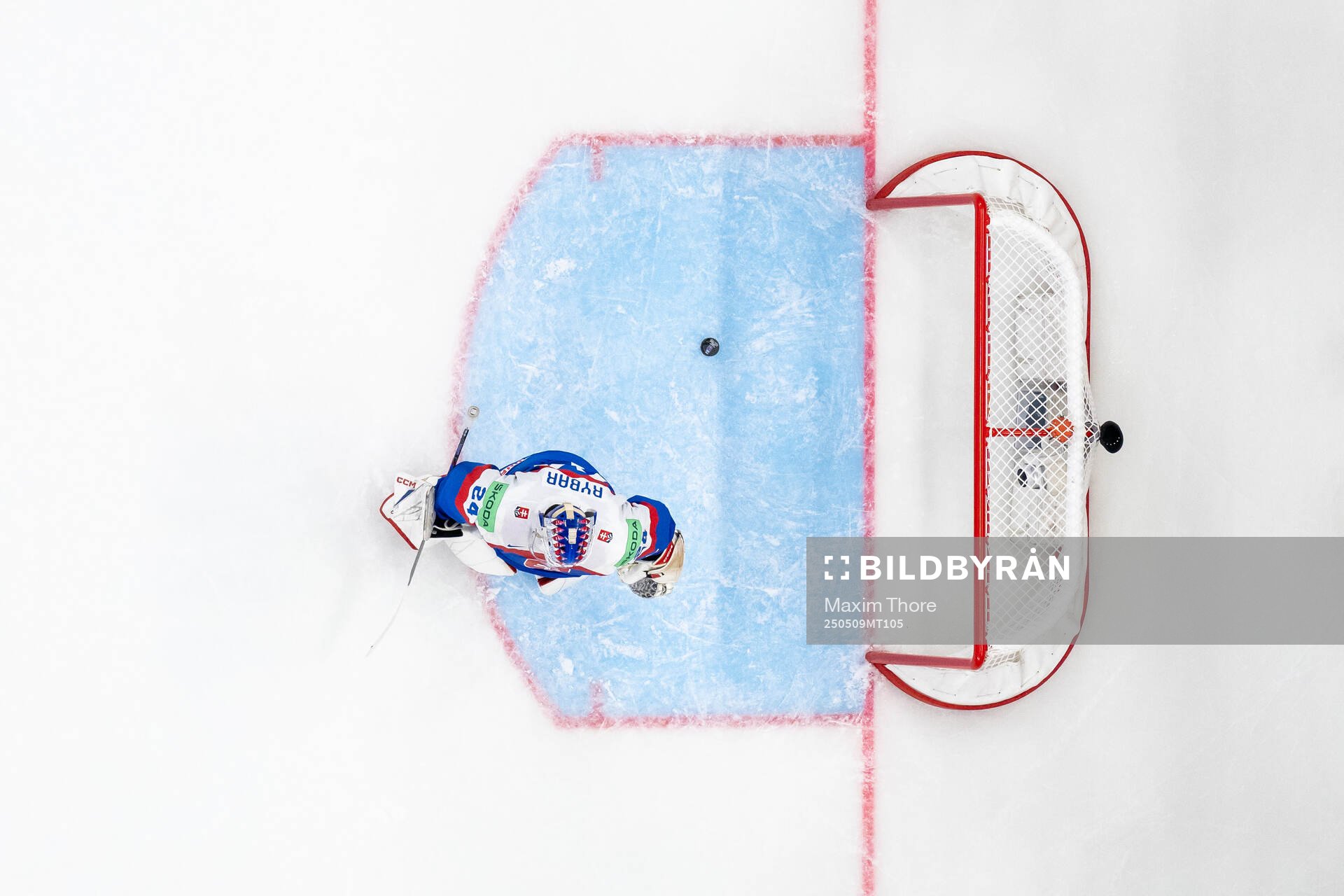 Goaltender Patrik Rybar of Slovakia looks dejected