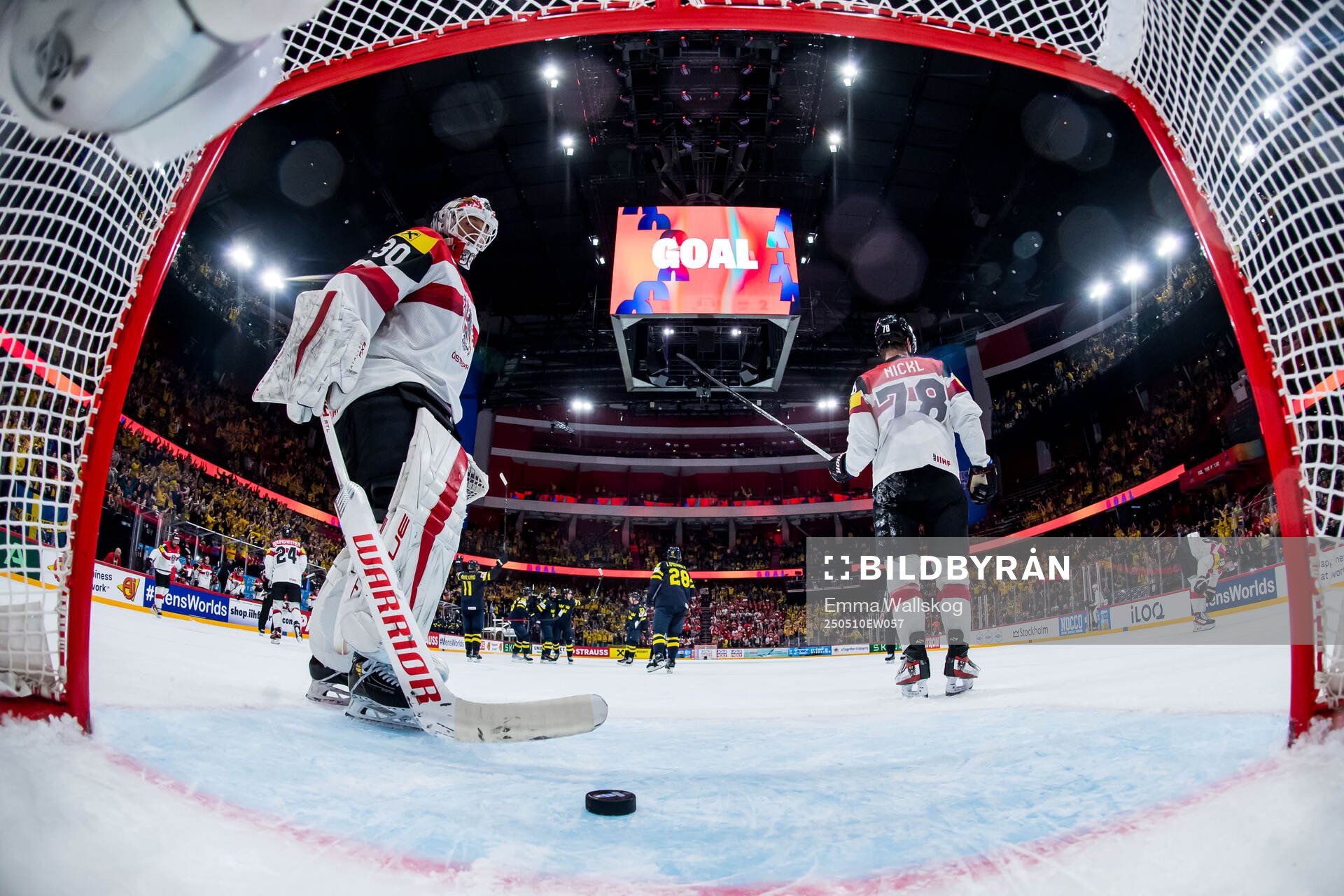 Players of Sweden celebrate and goaltender David Kickert of