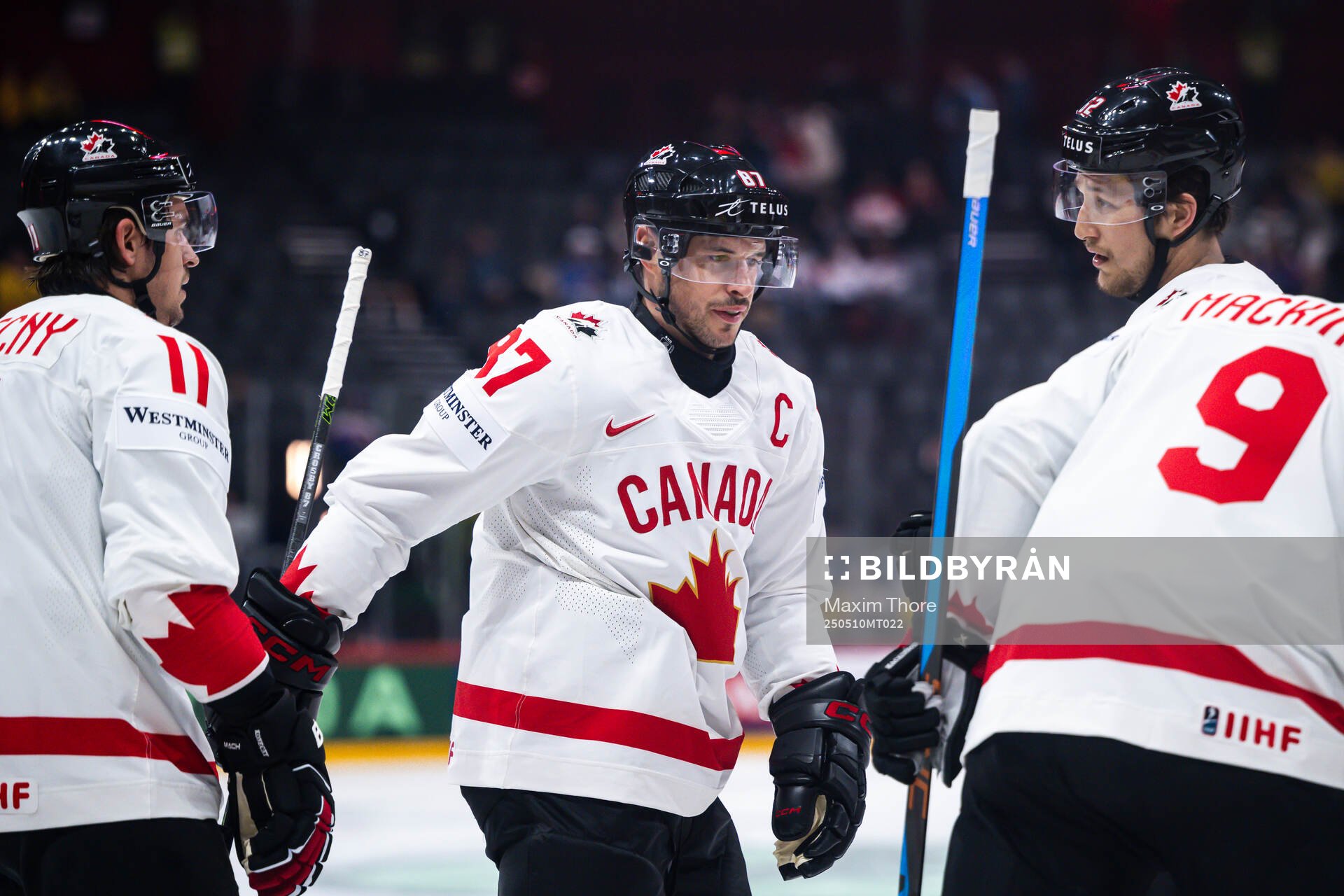 Sidney Crosby of Canada celebrate the 1-0 goal by Bo Horvat