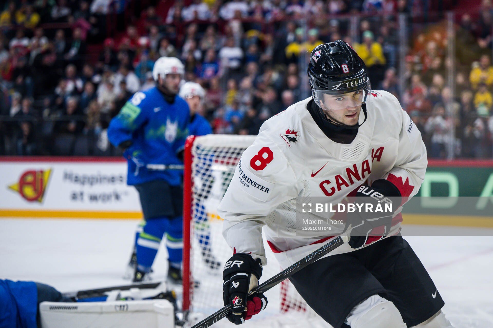 Noah Dobson of Canada celebrates